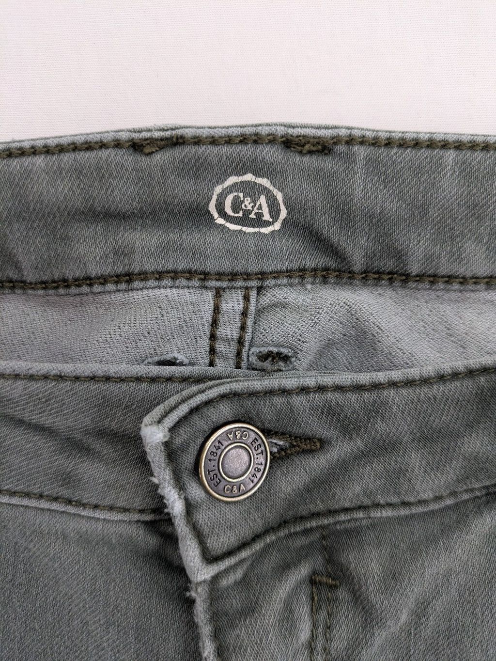 C&A grey skinny jeans with classic 5-pocket design and stretch cotton blend.