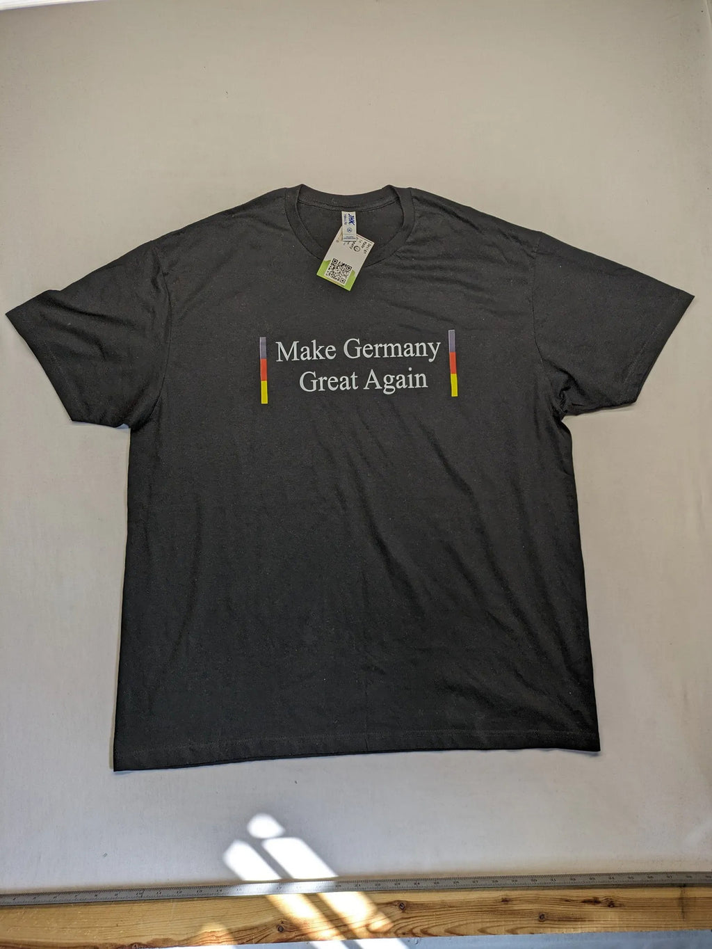 AFD turtle neck jumper multi "Make Germany Great Again" print with German flag colors.