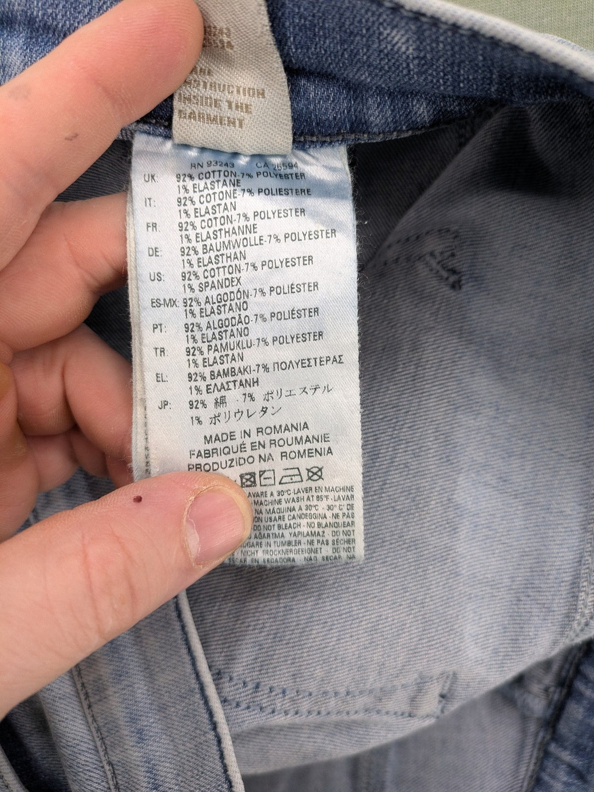 Diesel blue bootcut jeans with white patch pockets and regular waist, stylish stretch material.