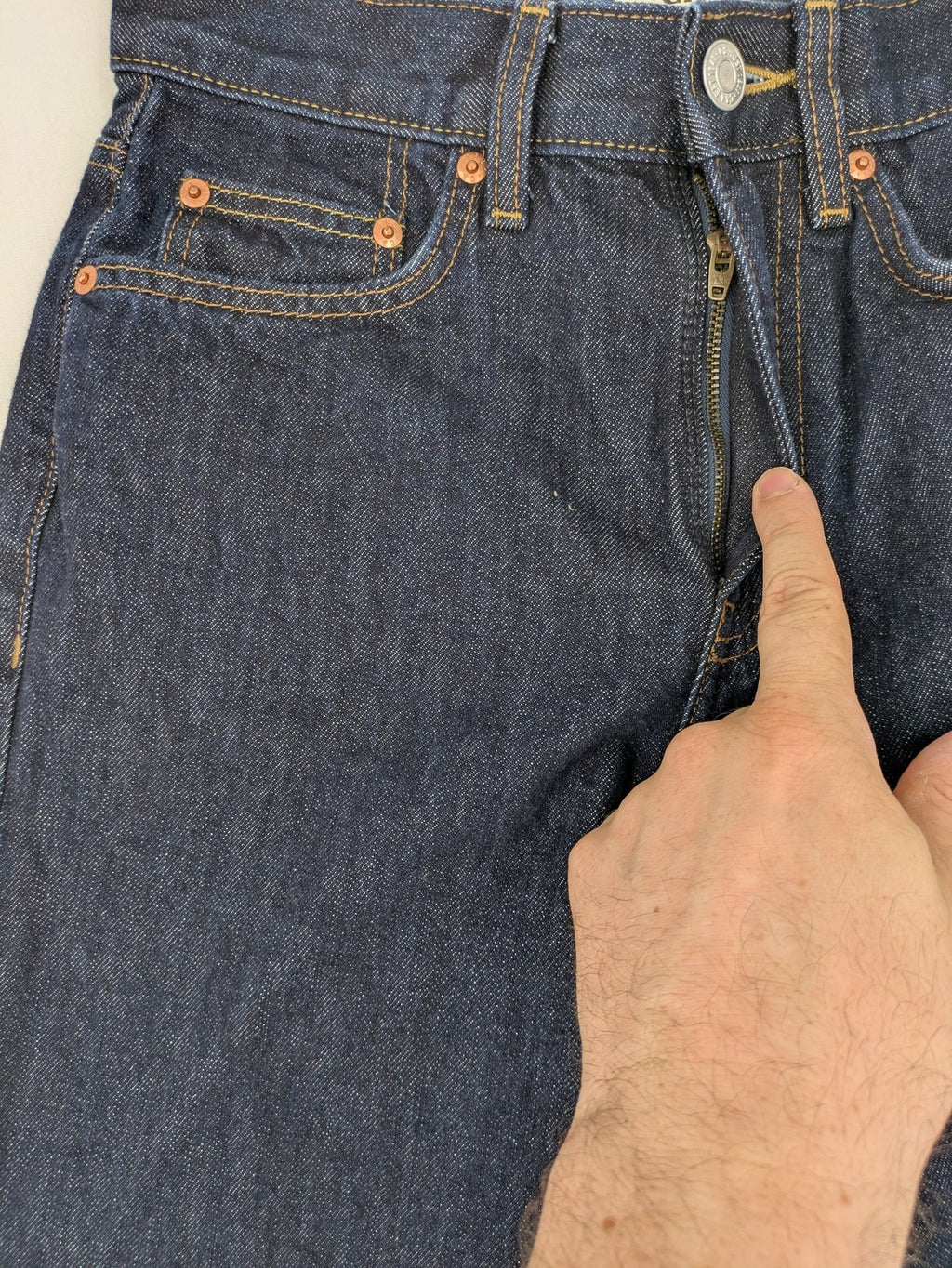 C&A blue straight jeans W28 L32 with 5-pocket design and contrasting orange stitching.