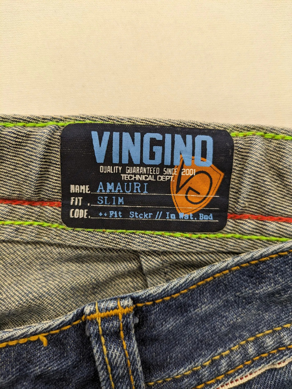 Vingino blue straight jeans medium wash 5-pocket design with zipper fly and stretch denim.