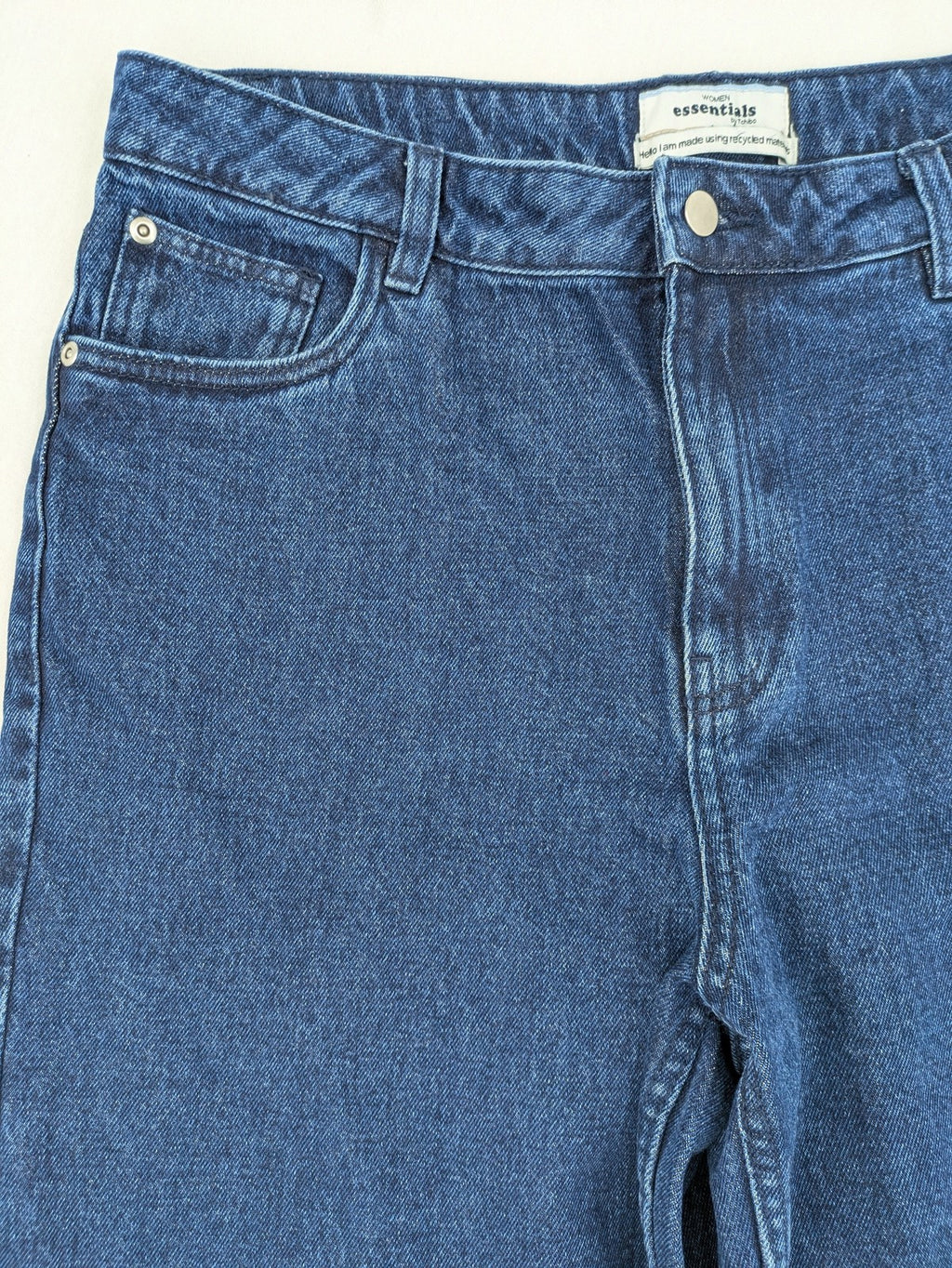 Tchibo blue straight jeans with five-pocket design and wide leg cut in durable cotton.