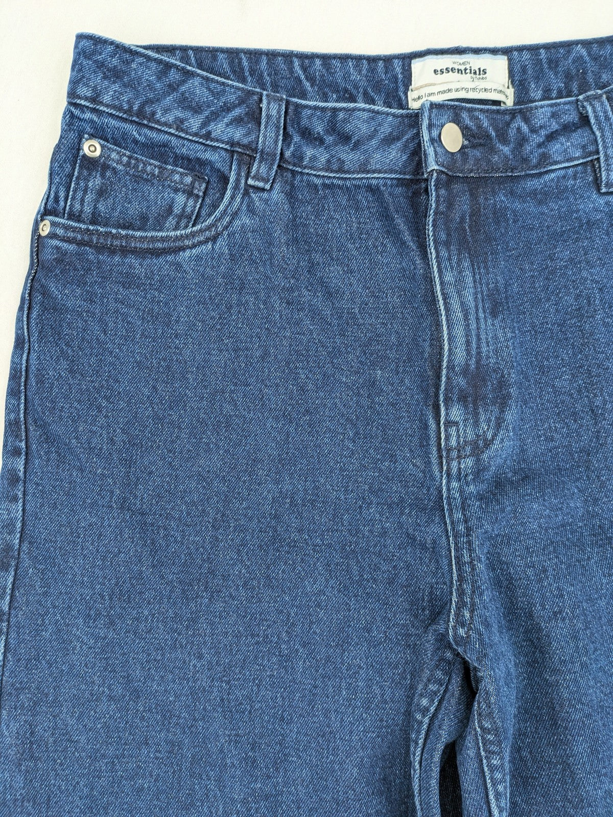 Tchibo blue straight jeans with five-pocket design and wide leg cut in durable cotton.