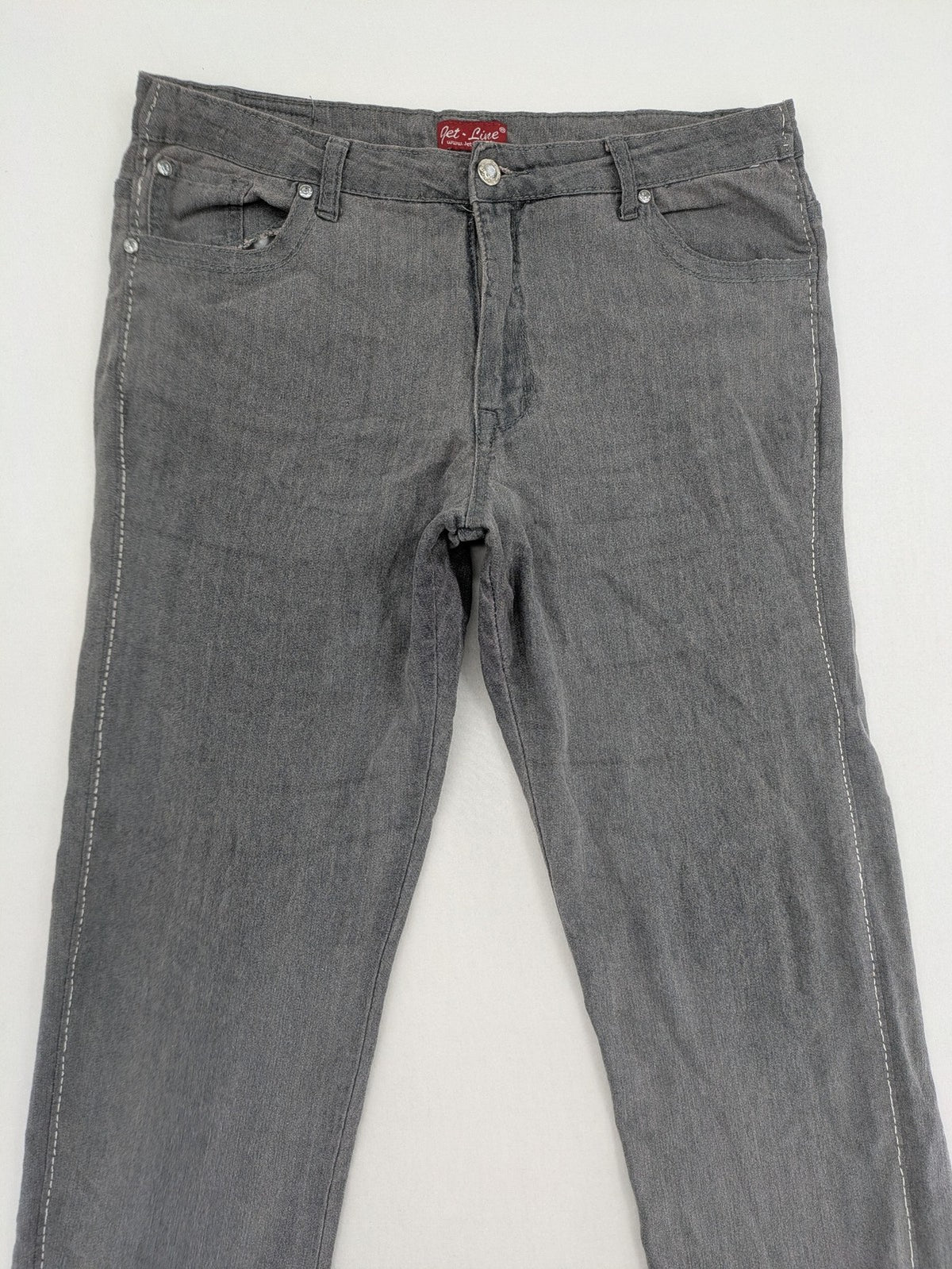 Jet Line grey straight jeans with embellished back pockets and frayed hem details.