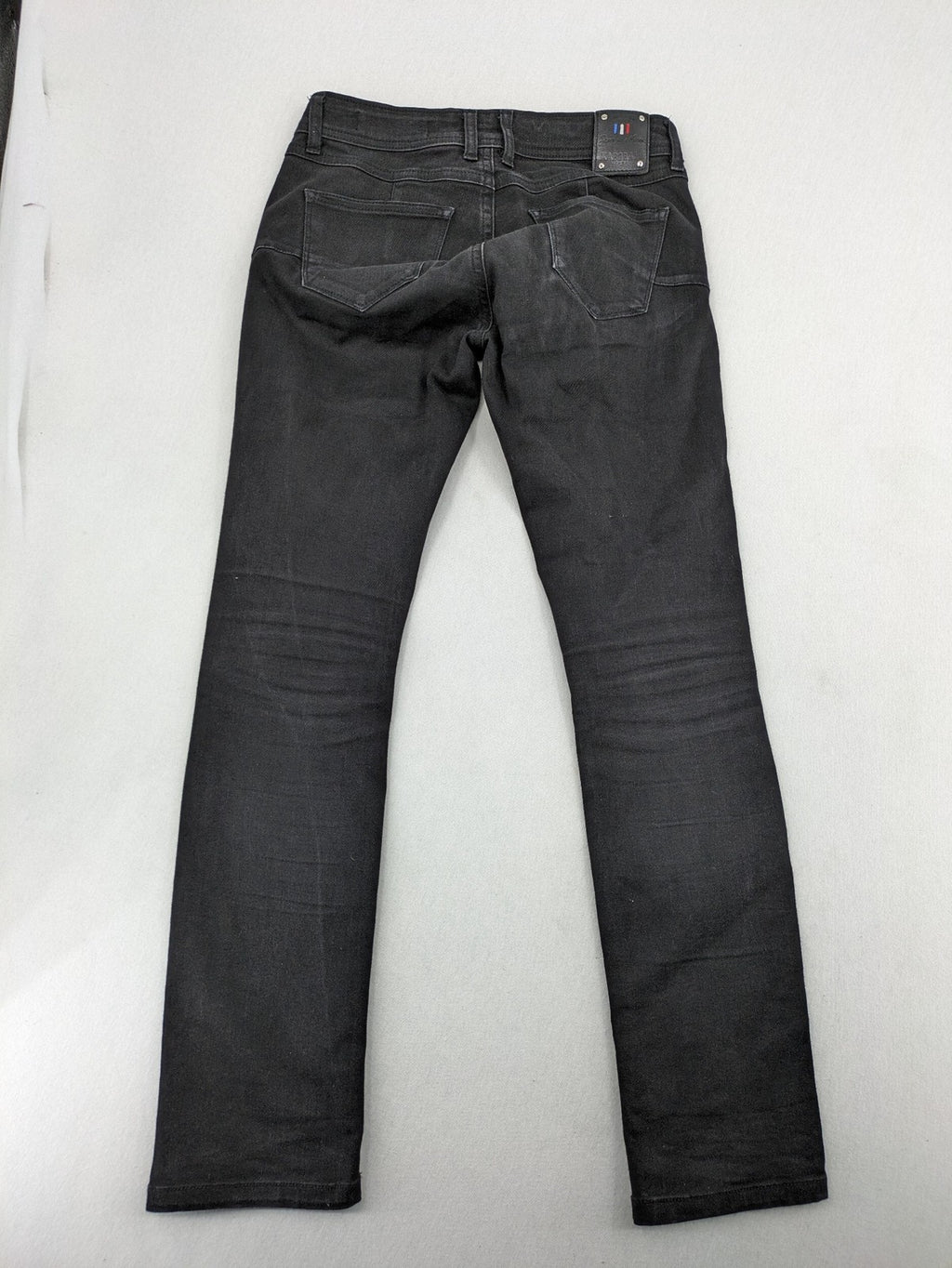 Kaporal black slim fit jeans with classic 5-pocket design and stretch denim material.