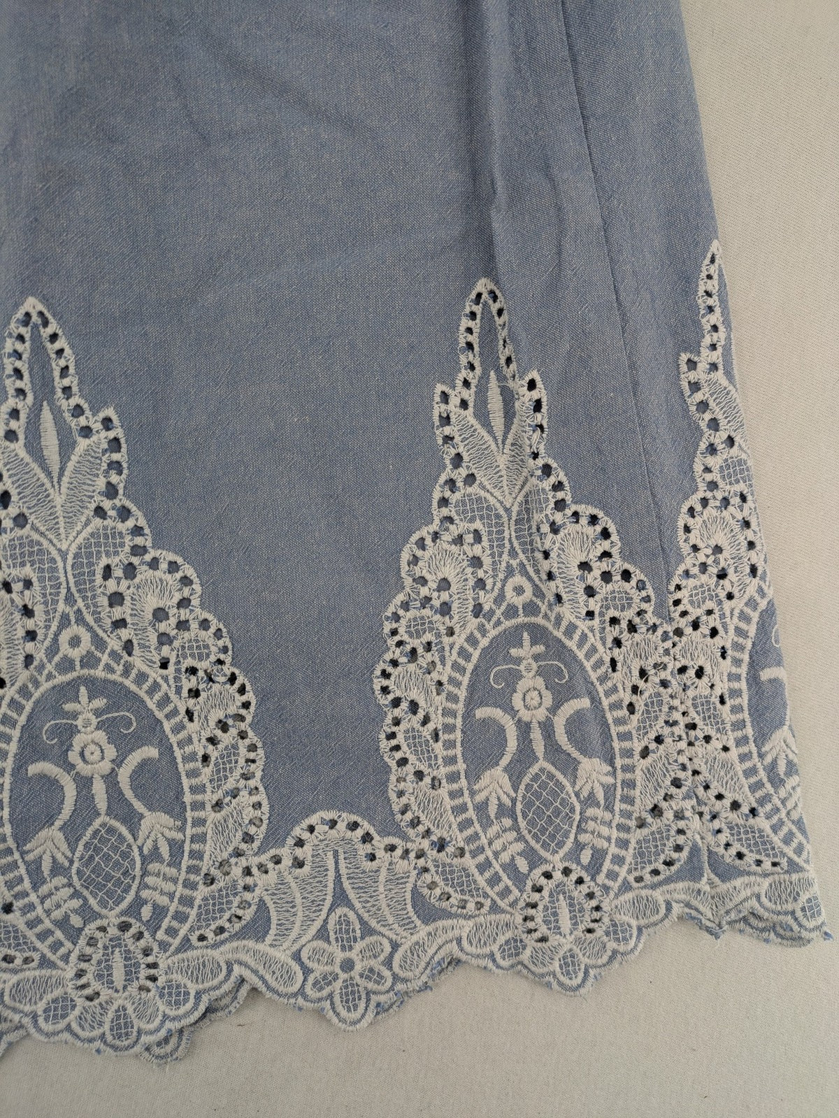 Yessica C&A blue A-line dress with white lace embroidery and side zipper.