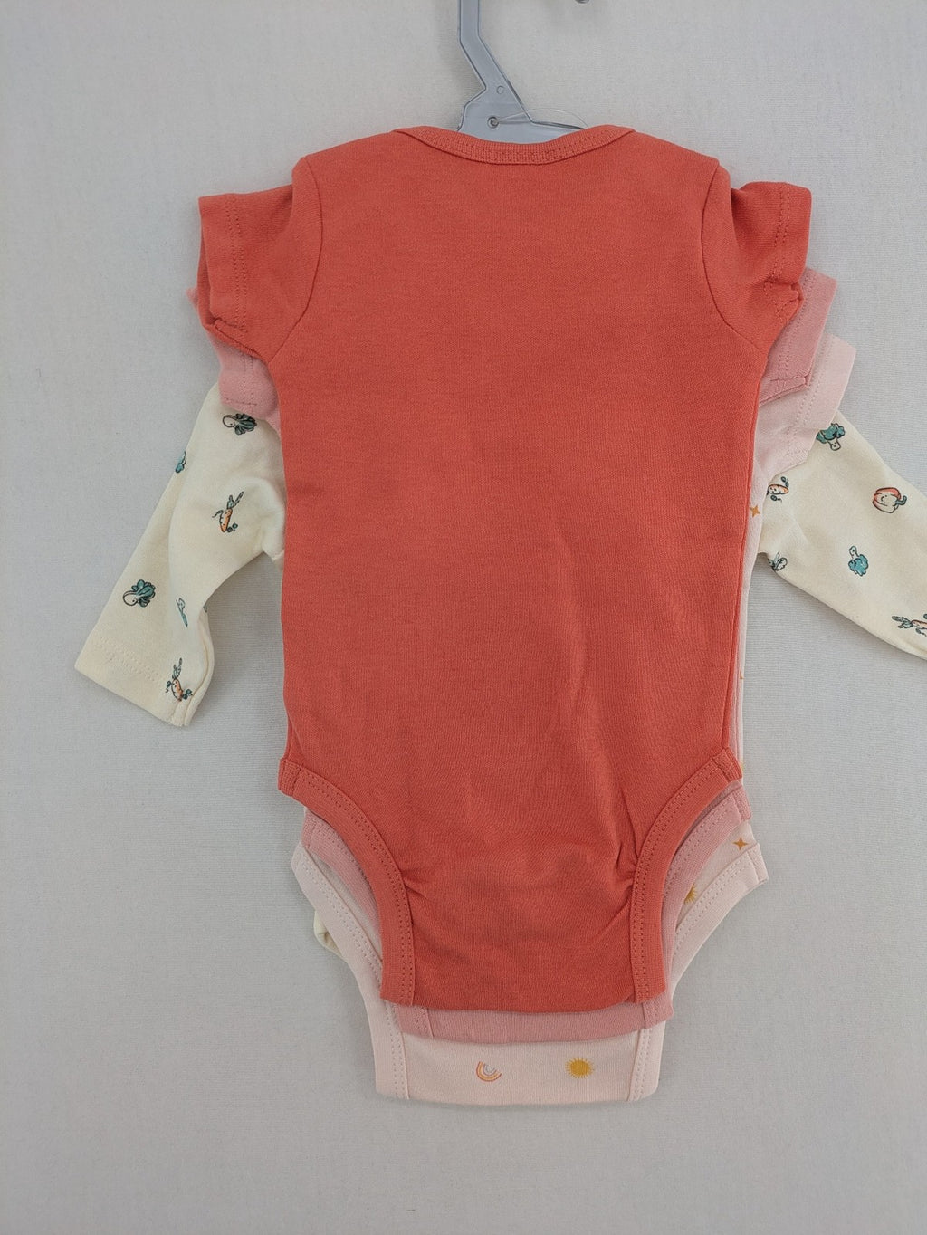 Ergee baby bodysuits set blue cream orange various cute patterns and wrap design.