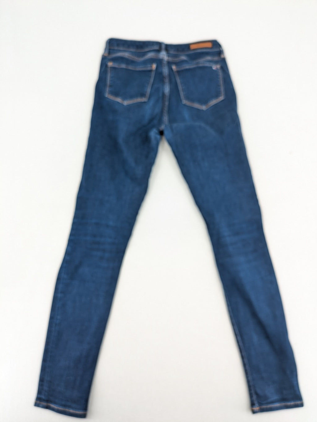 Tommy Hilfiger blue skinny jeans, five-pocket design, made from organic cotton blend.