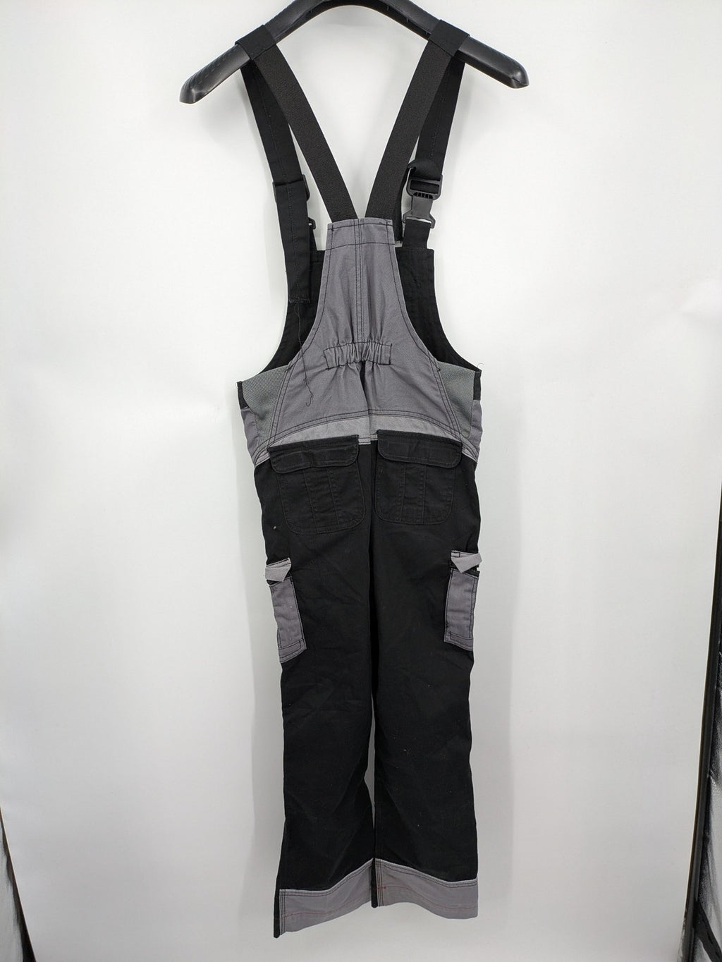 Cargo pants black grey two-tone design with red stitching and multiple pockets