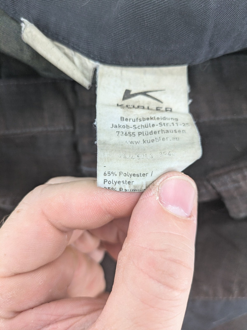 Kübler work pants blue grey Cordura fabric with multiple cargo pockets and reflective details.
