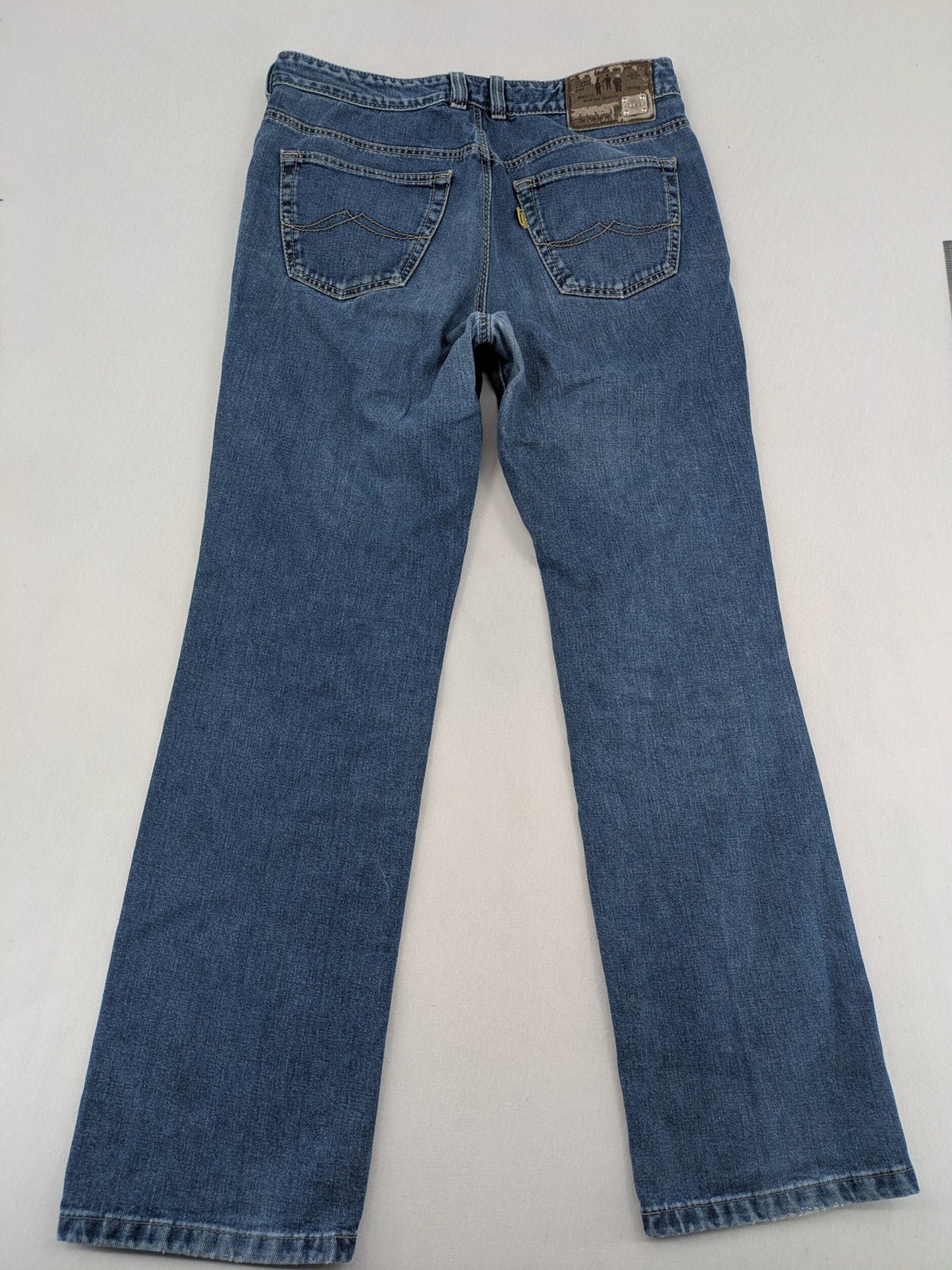 Joker blue straight leg jeans with double saddle stitched detail and classic denim wash.