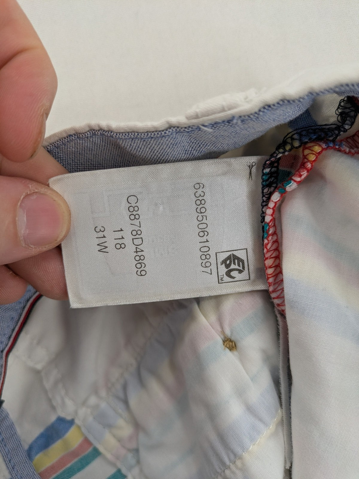 Tommy Hilfiger chino shorts blue and green striped pattern with iconic flag logo.