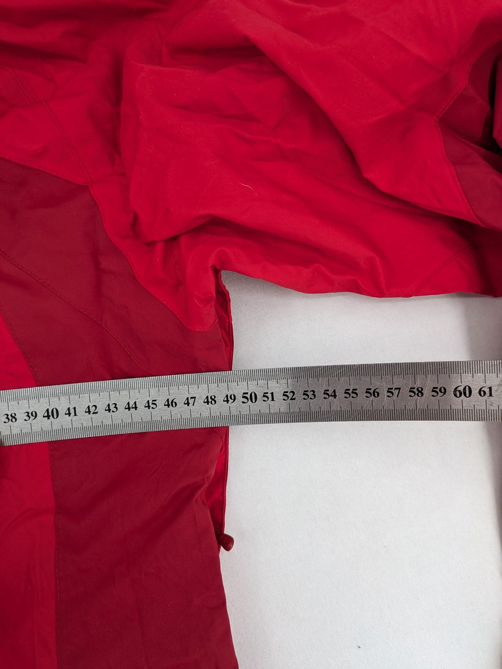 Jack Wolfskin red outdoor jacket with adjustable hood and Texapore waterproof technology
