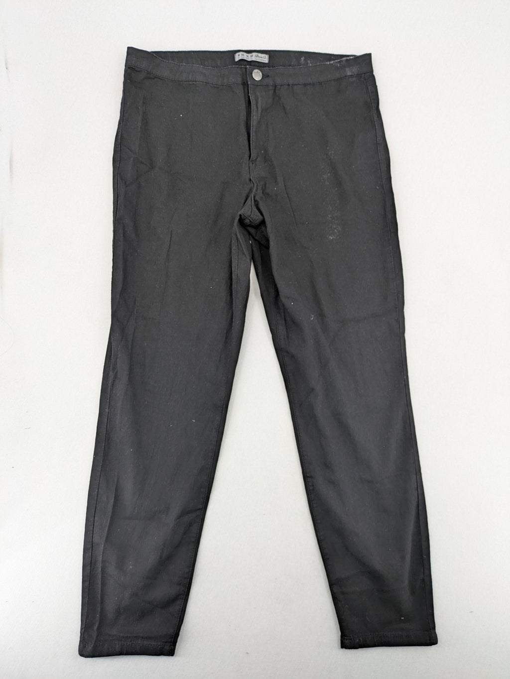 Denim & Co. black straight jeans with front button closure and back pockets.