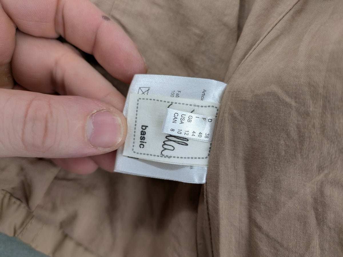 MORE & MORE beige field jacket with belt, four pockets, and standing collar.