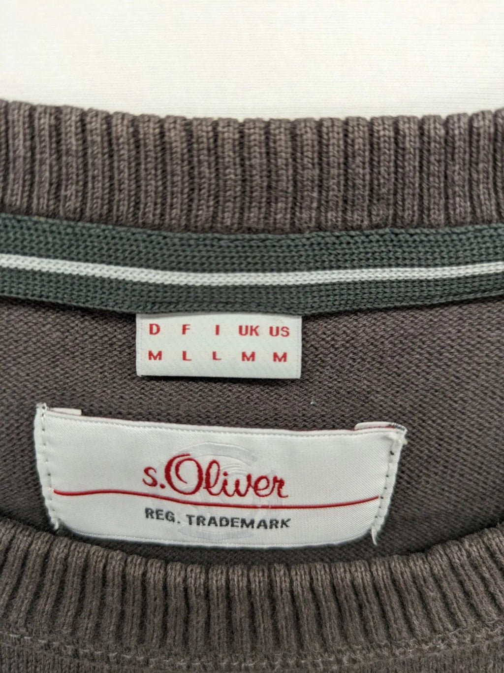 s.Oliver brown turtle neck jumper with "Radford Inc." graphic print and ribbed cuffs.