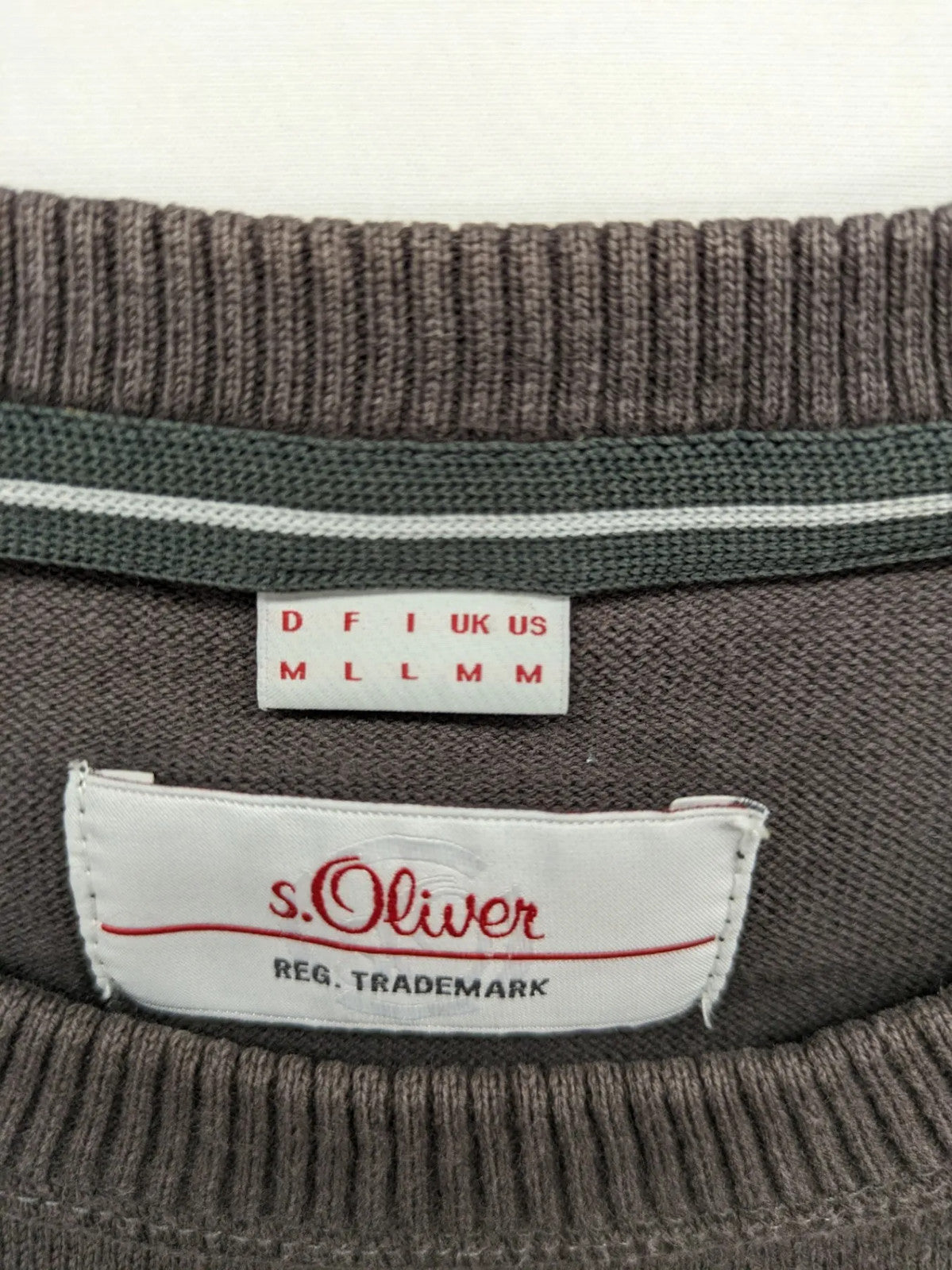 s.Oliver brown turtle neck jumper with "Radford Inc." graphic print and ribbed cuffs.