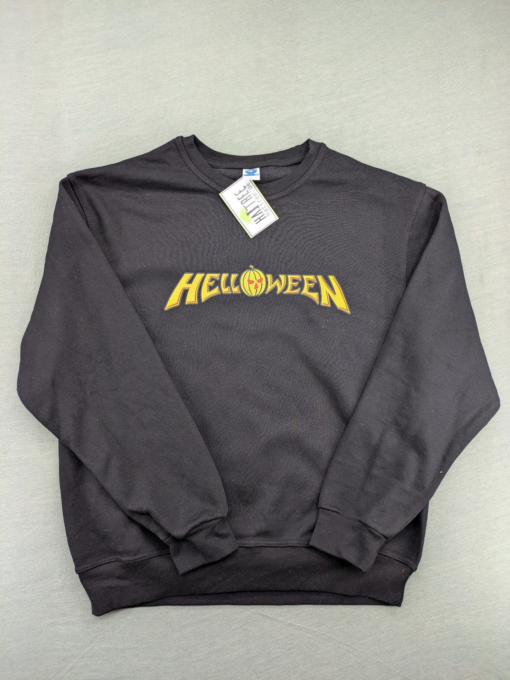Helloween grey sweatshirt featuring bright yellow pumpkin logo, made from cotton blend.