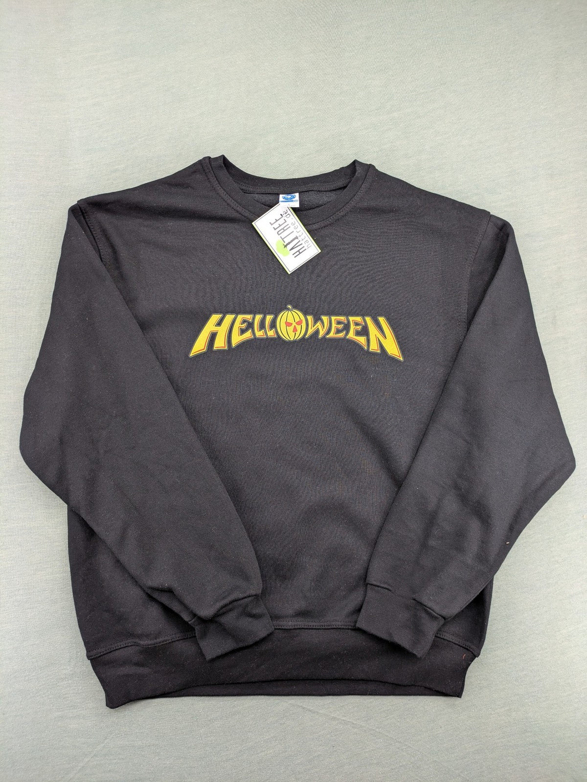 Helloween grey sweatshirt featuring bright yellow pumpkin logo, made from cotton blend.
