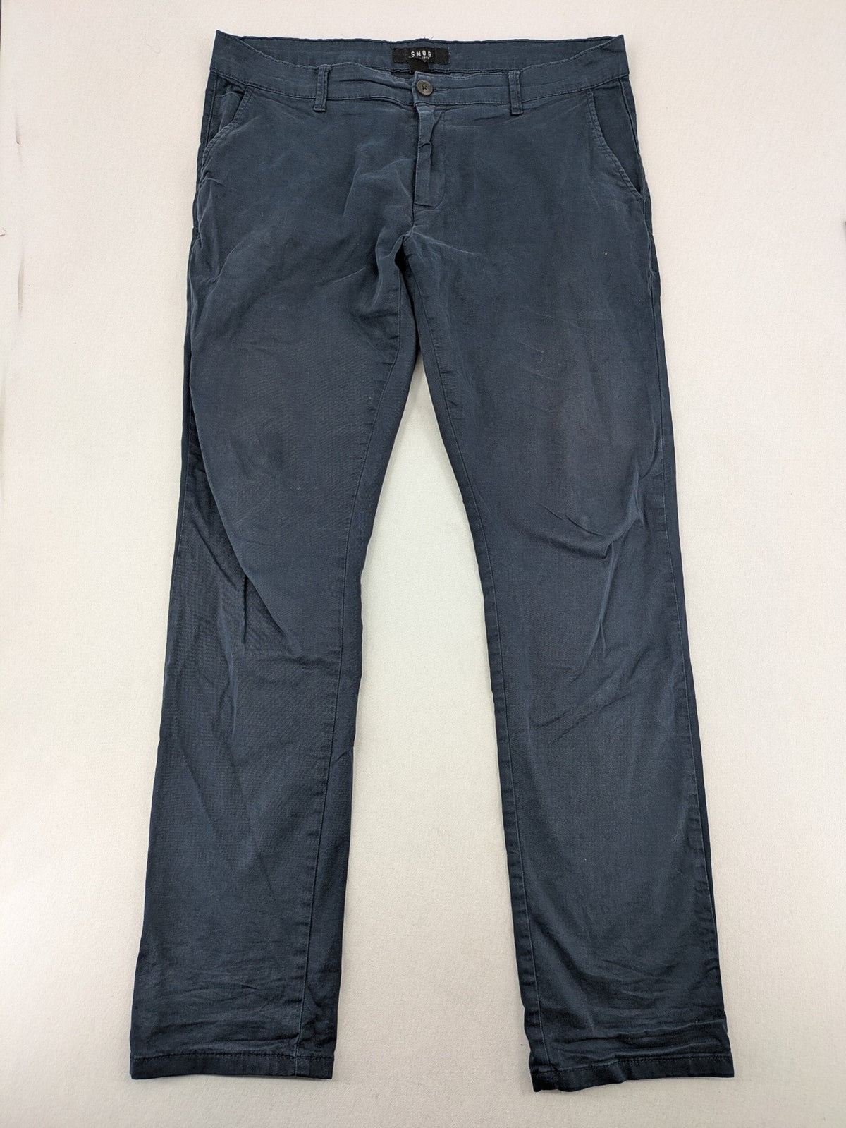 smog blue chino pants with belt loops, button fly, and side pockets