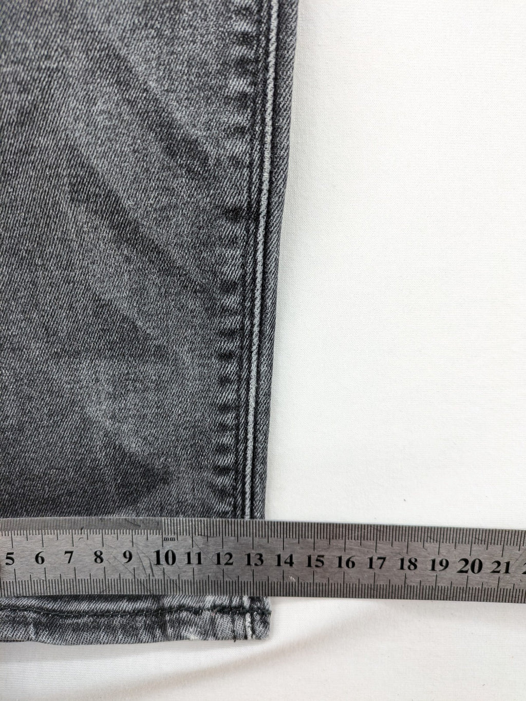 H&M grey skinny jeans with low rise, classic 5-pocket style, and washed denim finish.