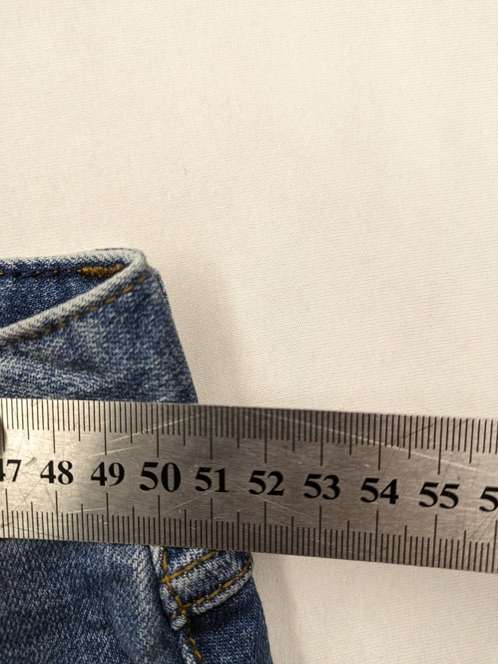 Montego blue straight jeans with stretch denim, classic design, and regular fit.