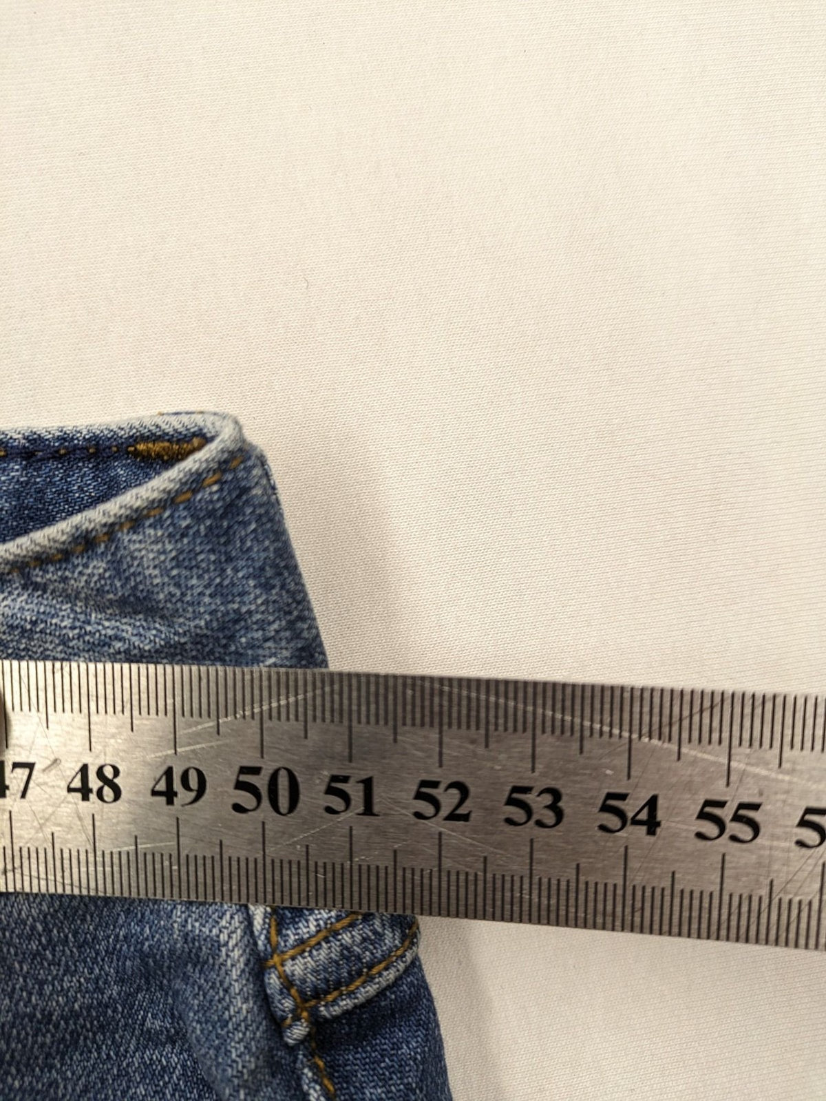 Montego blue straight jeans with stretch denim, classic design, and regular fit.