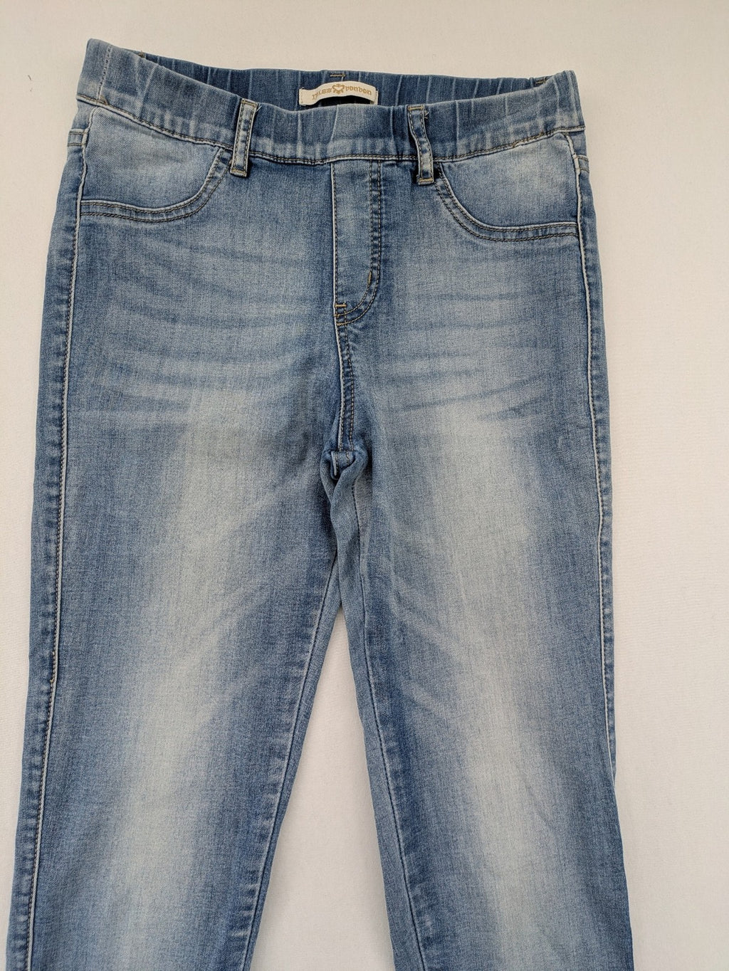 Miss Bonbon blue skinny jeans jeggings with elastic pull-on waistband and light wash.