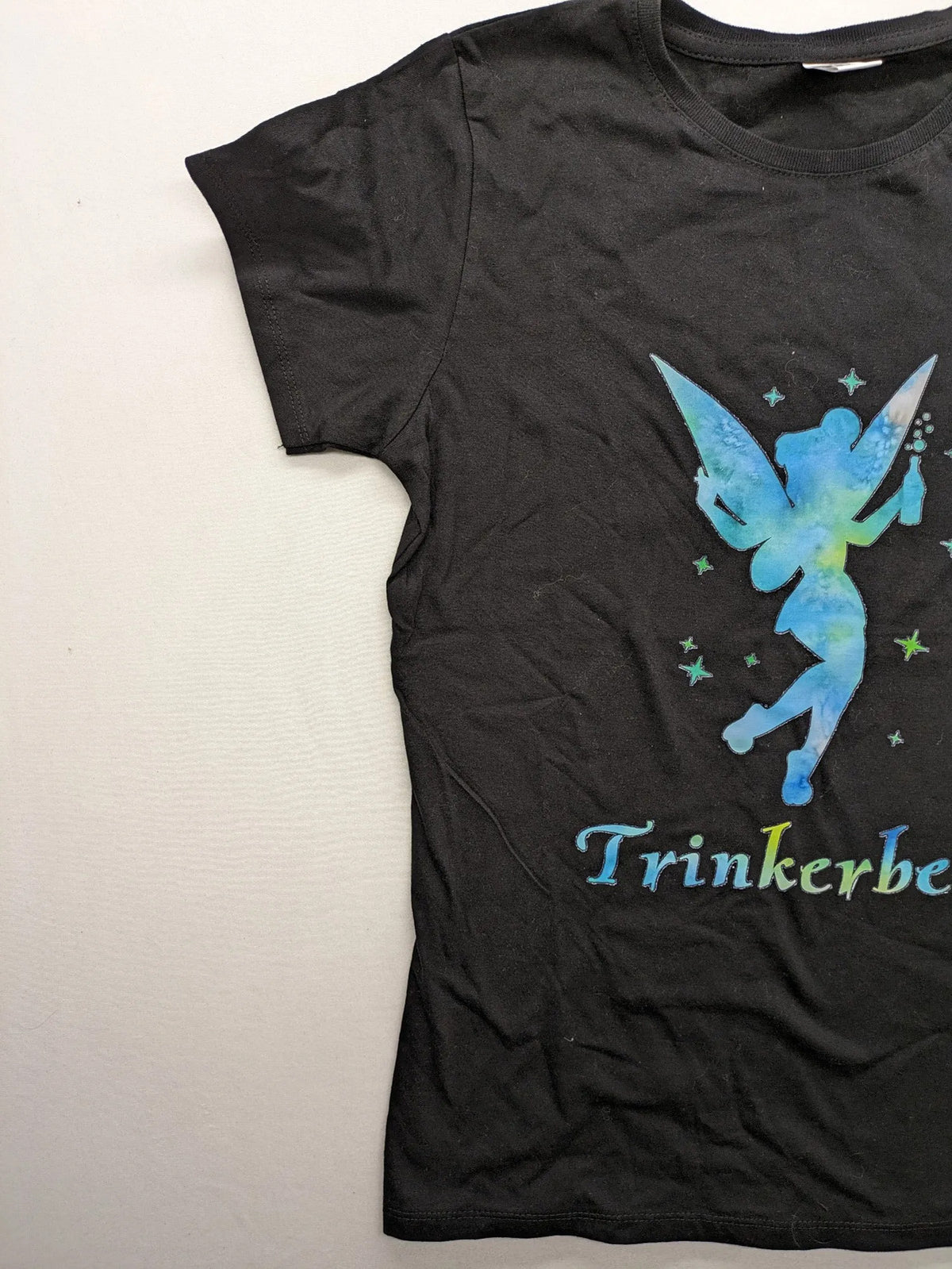 Roly multi T-shirt black with Tinkerbell graphic and comfortable round neckline.