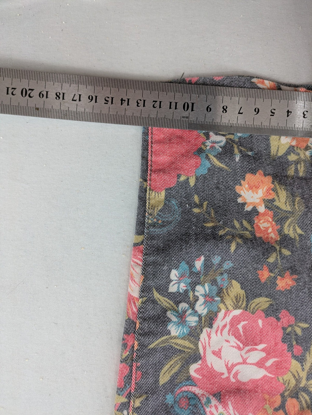 ONLY blue straight jeans with vibrant floral and paisley print on denim fabric.