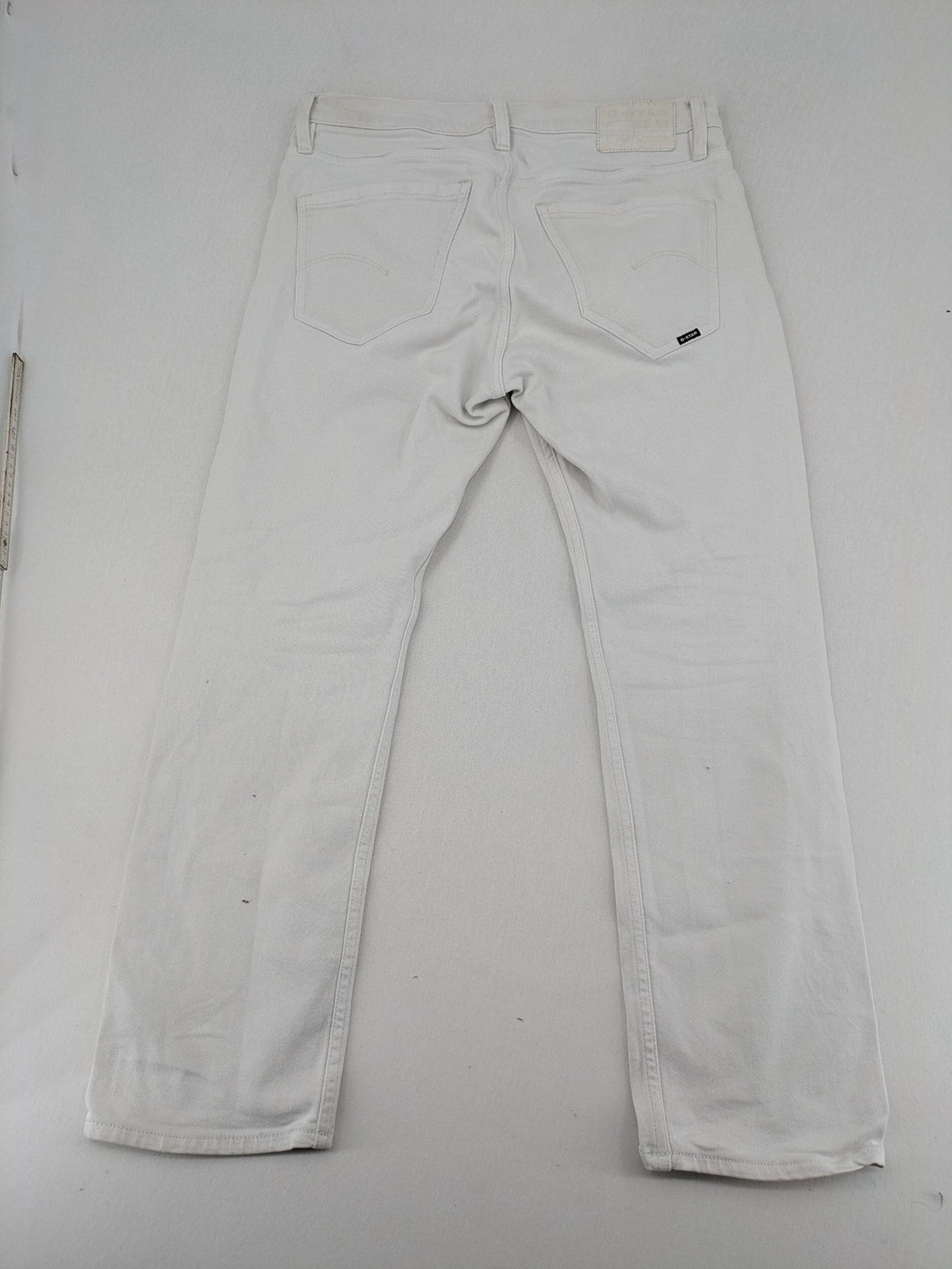 G-Star Raw white straight jeans with logo patch and stretch denim material.
