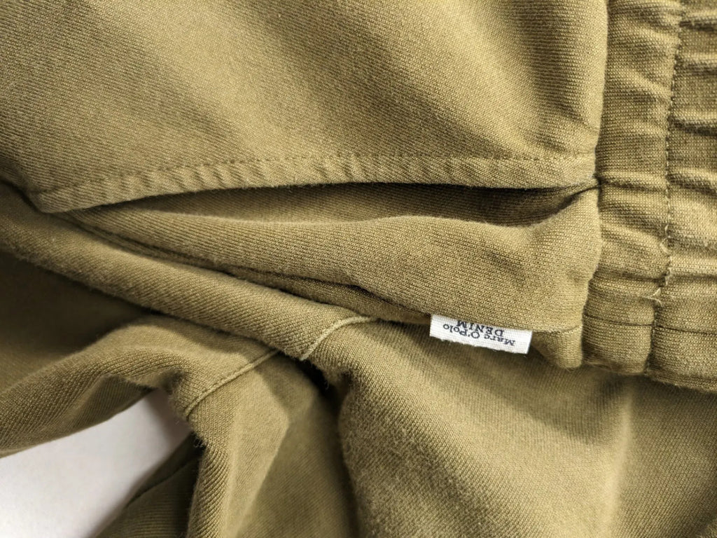 Marc O'Polo khaki joggers with elastic waistband and stylish front seams.