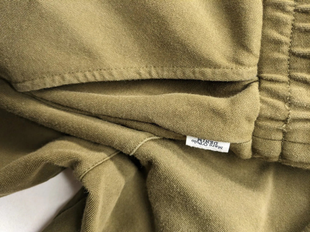 Marc O'Polo khaki joggers with elastic waistband and stylish front seams.