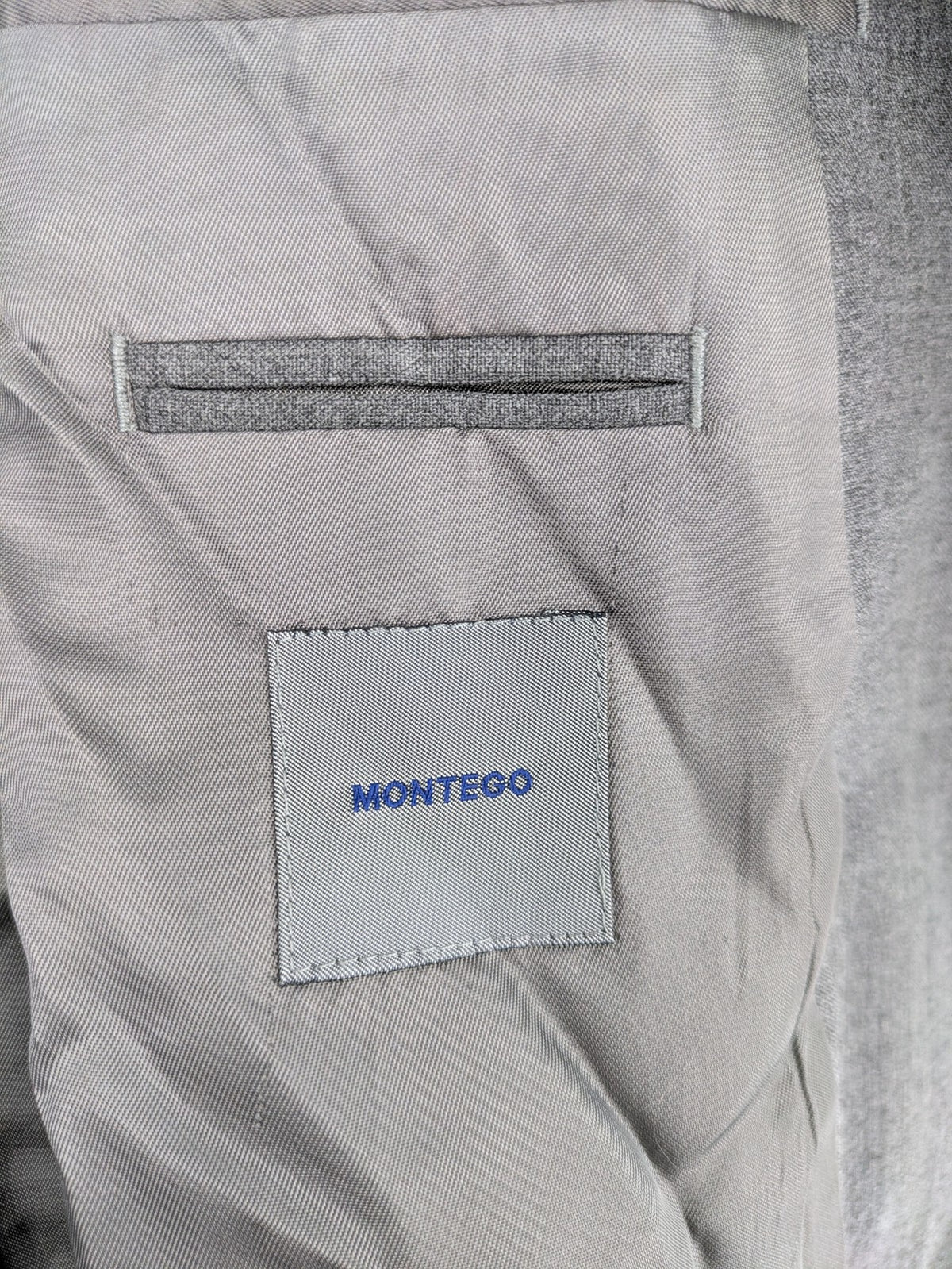 Montego grey blazer three-button design made from wool blend with smooth lining.