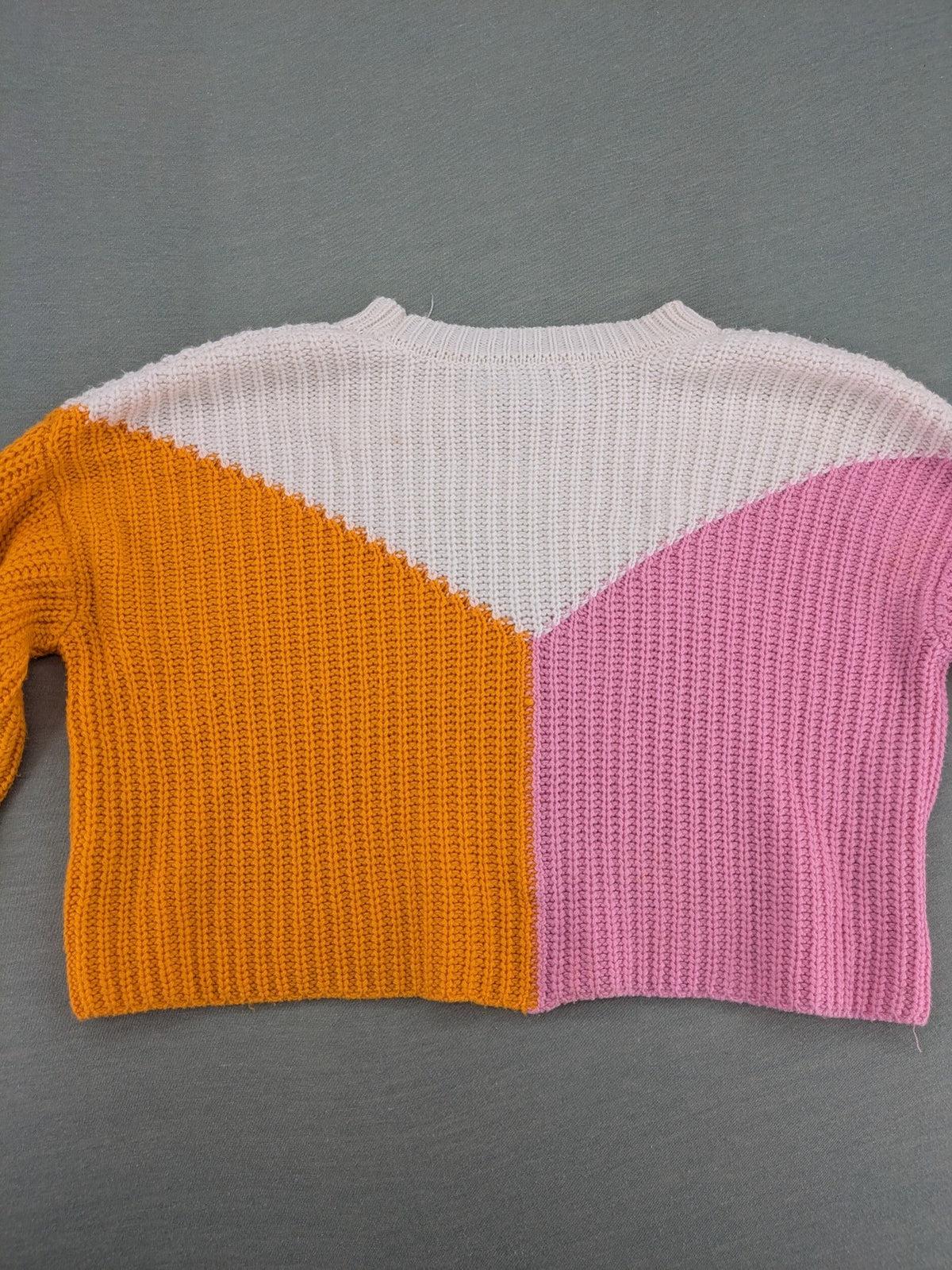 Sincerely Jules orange and pink colorblock turtle neck jumper with soft acrylic fabric.