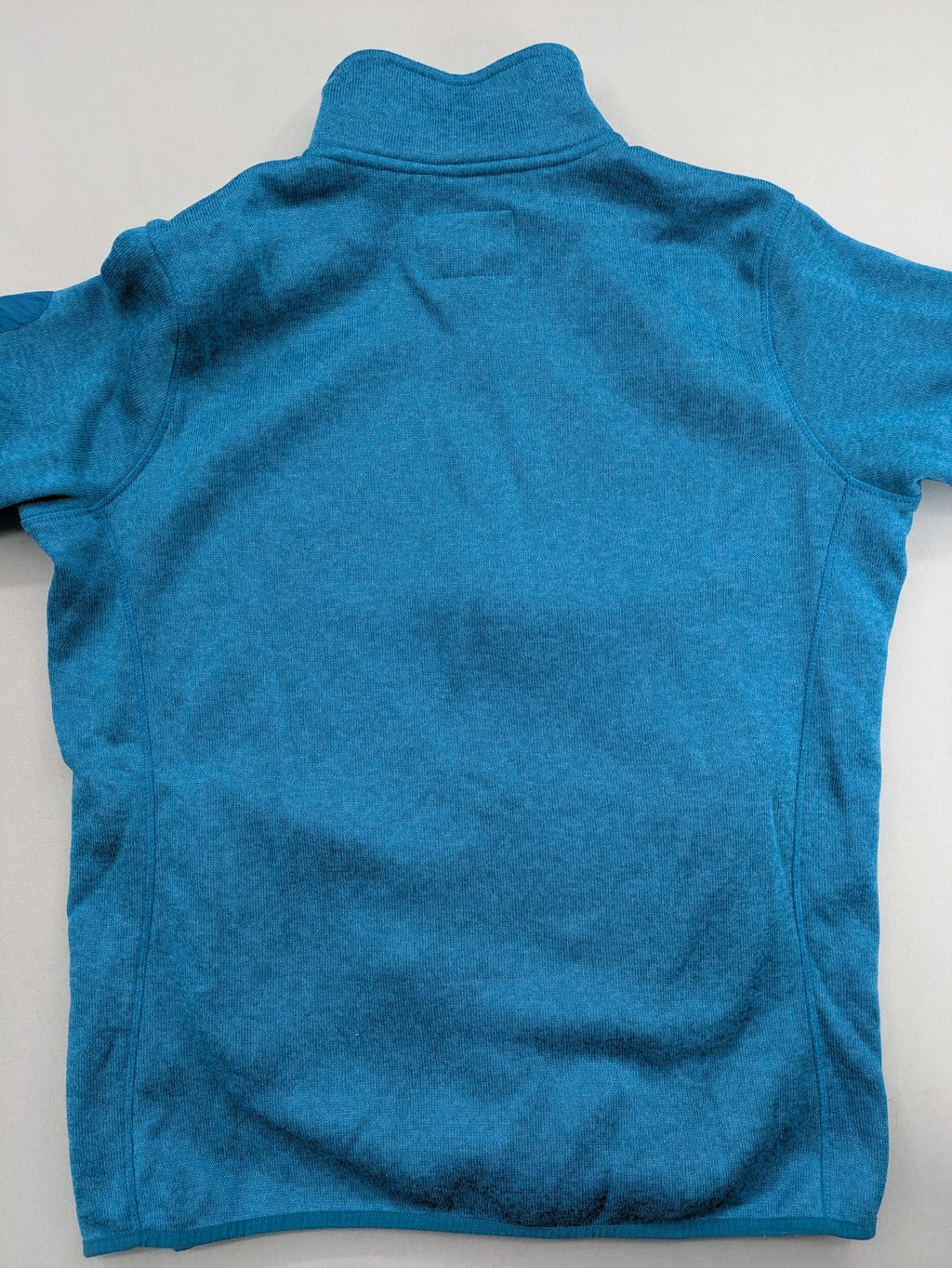 Stooker blue and turquoise fleece jacket with full zip and stand-up collar.