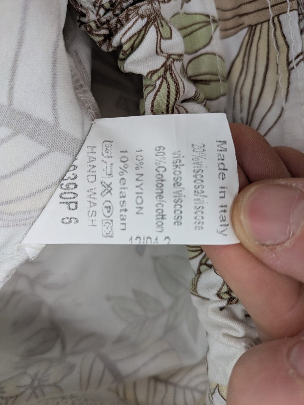 Made in Italy multi pants tropical floral pattern cotton-viscose blend on white background.