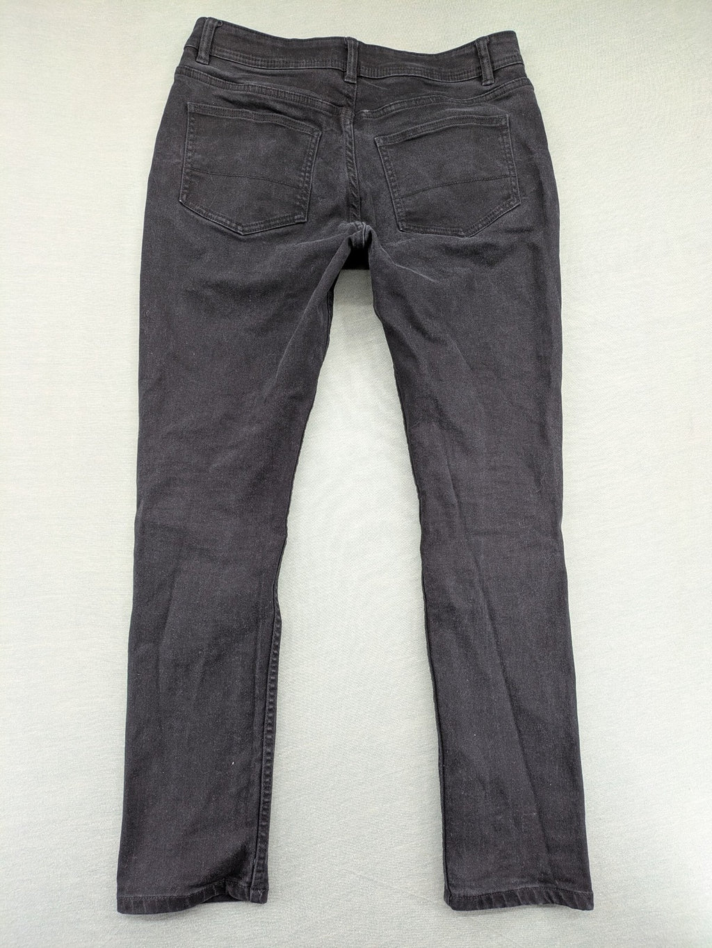 Denim & Co. grey slim fit jeans with button fly and classic 5-pocket design.