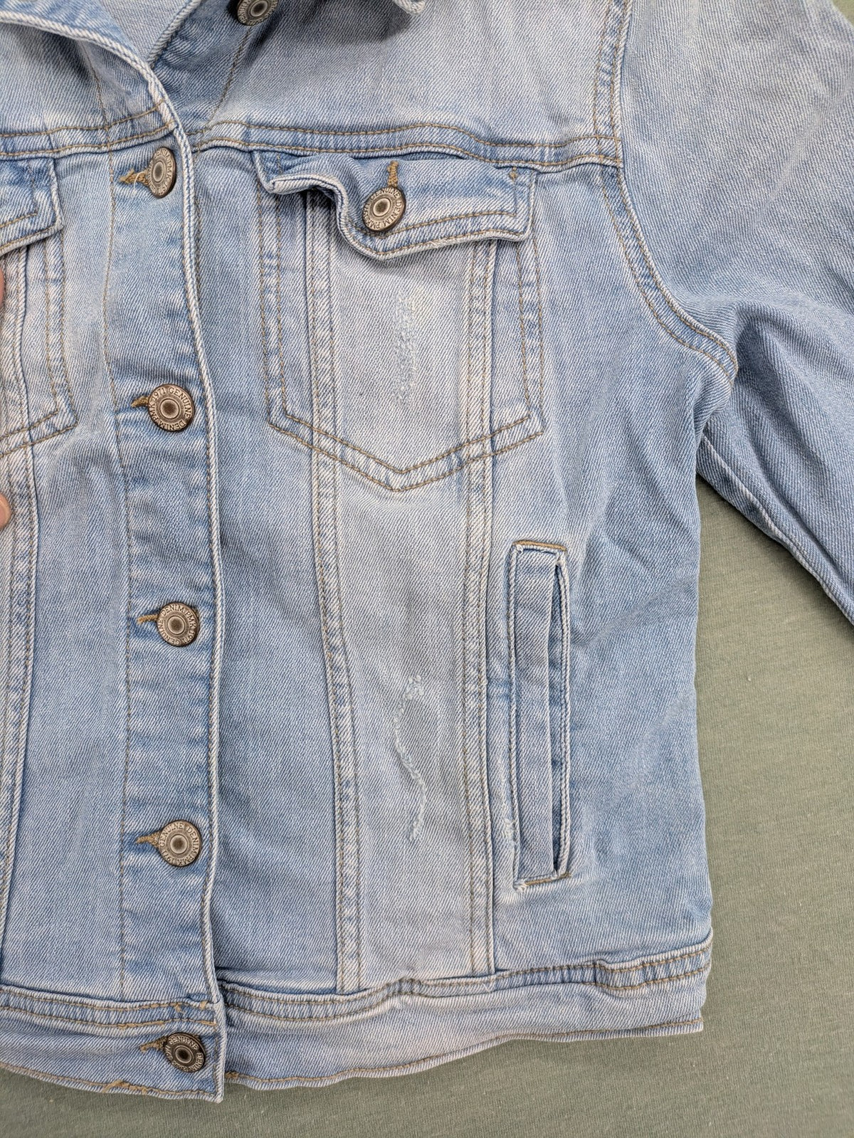 Pimkie blue denim jacket with classic cut, button placket, and two chest pockets.