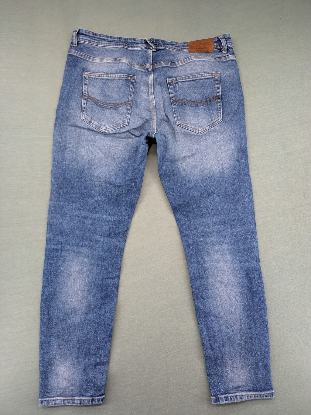 Pull&Bear blue straight jeans with distressed details and classic 5-pocket design.
