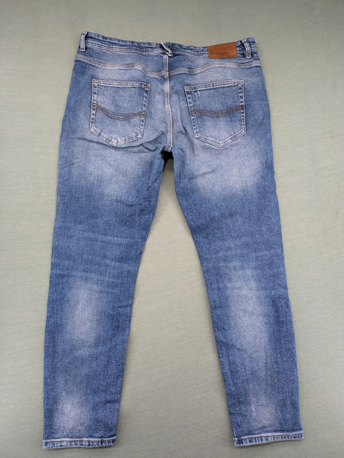 Pull&Bear blue straight jeans with distressed details and classic 5-pocket design.
