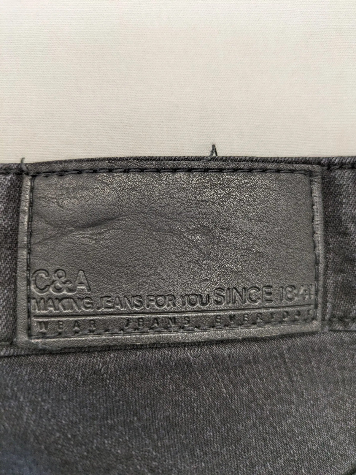 C&A grey straight jeans five-pocket design made from cotton blend with stretch.