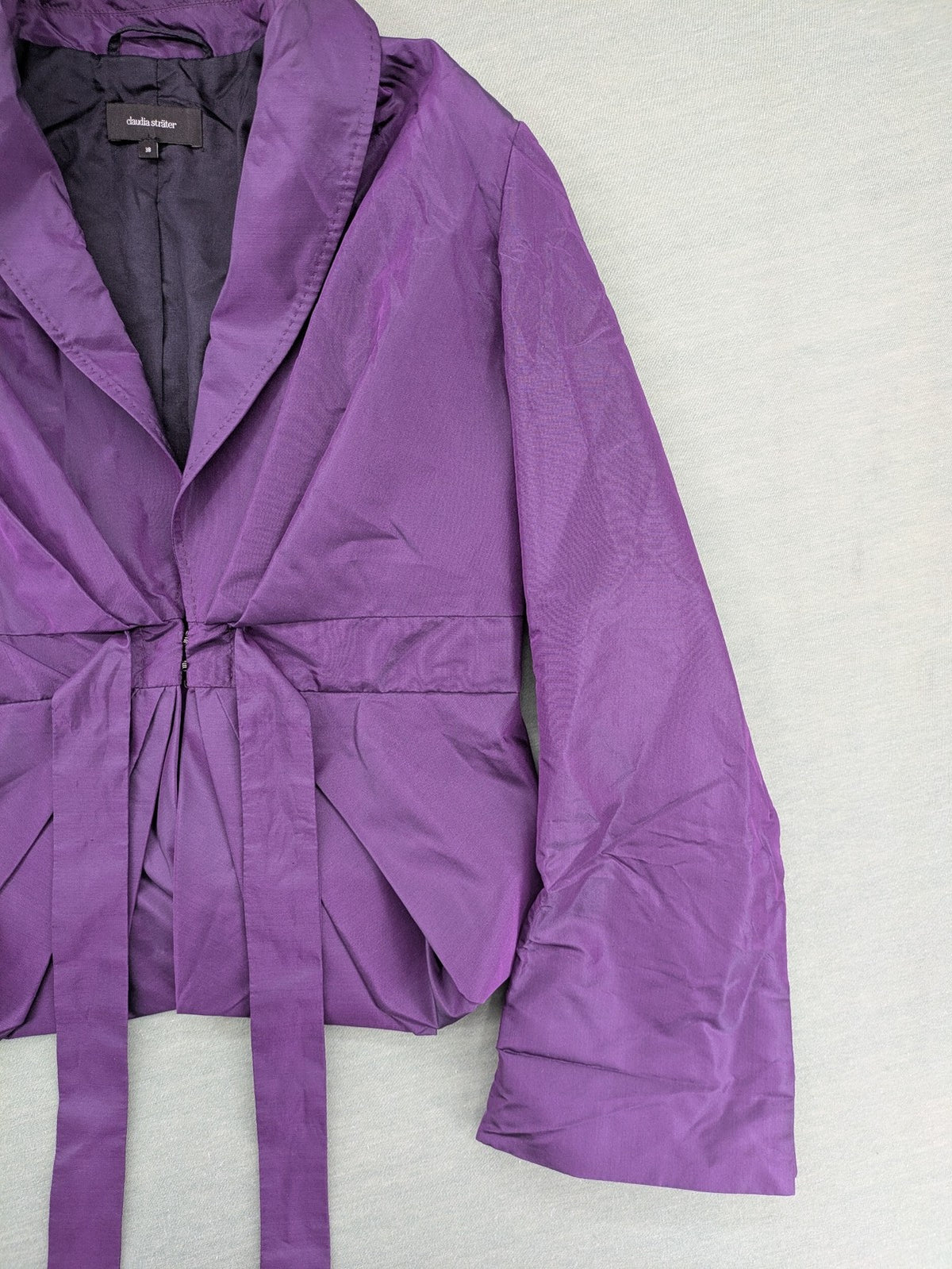 Claudia Sträter purple silk blazer with shawl collar and belt detail.
