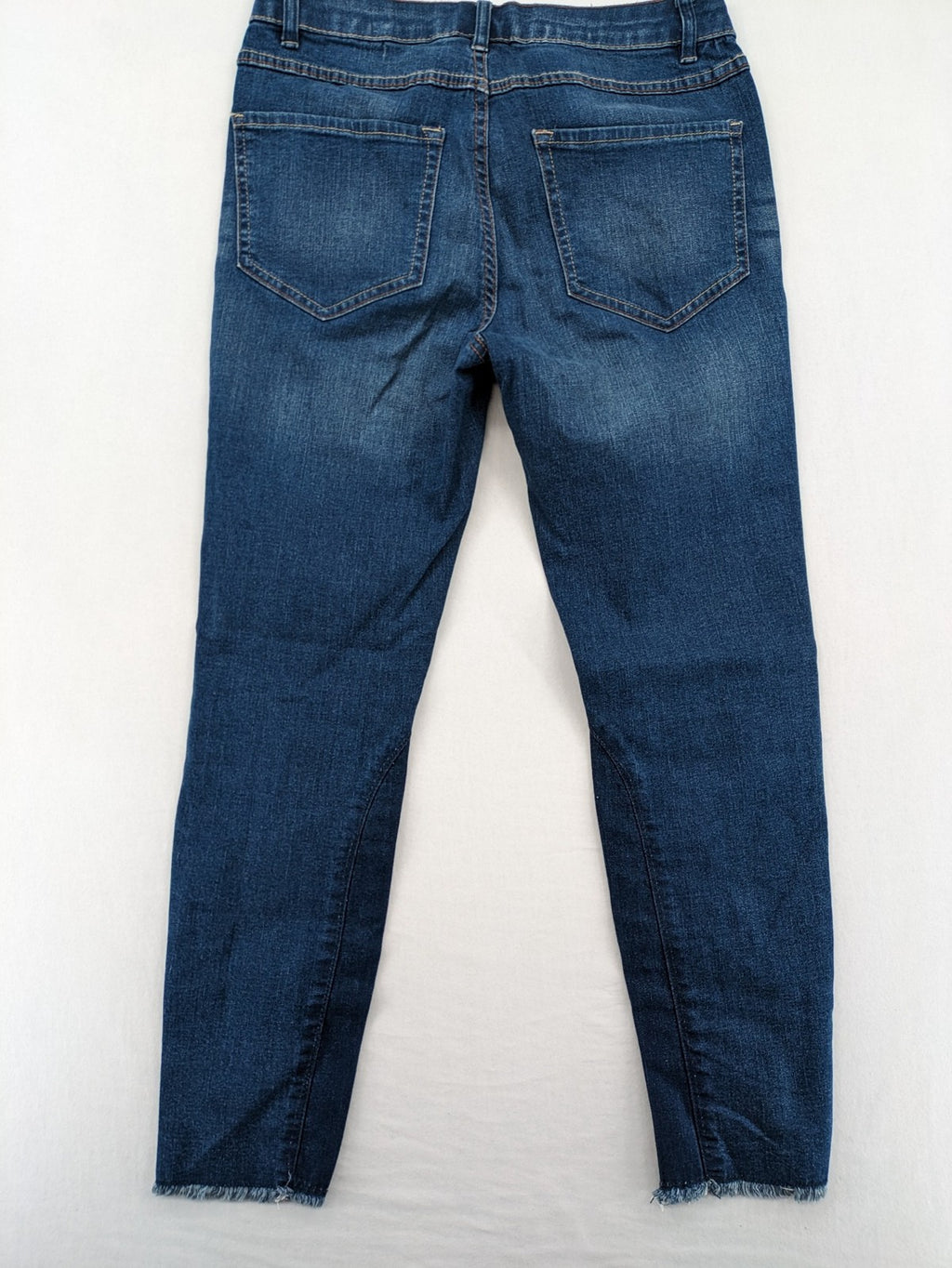 Best Connections blue skinny jeans with frayed hem and sporty side stripe.