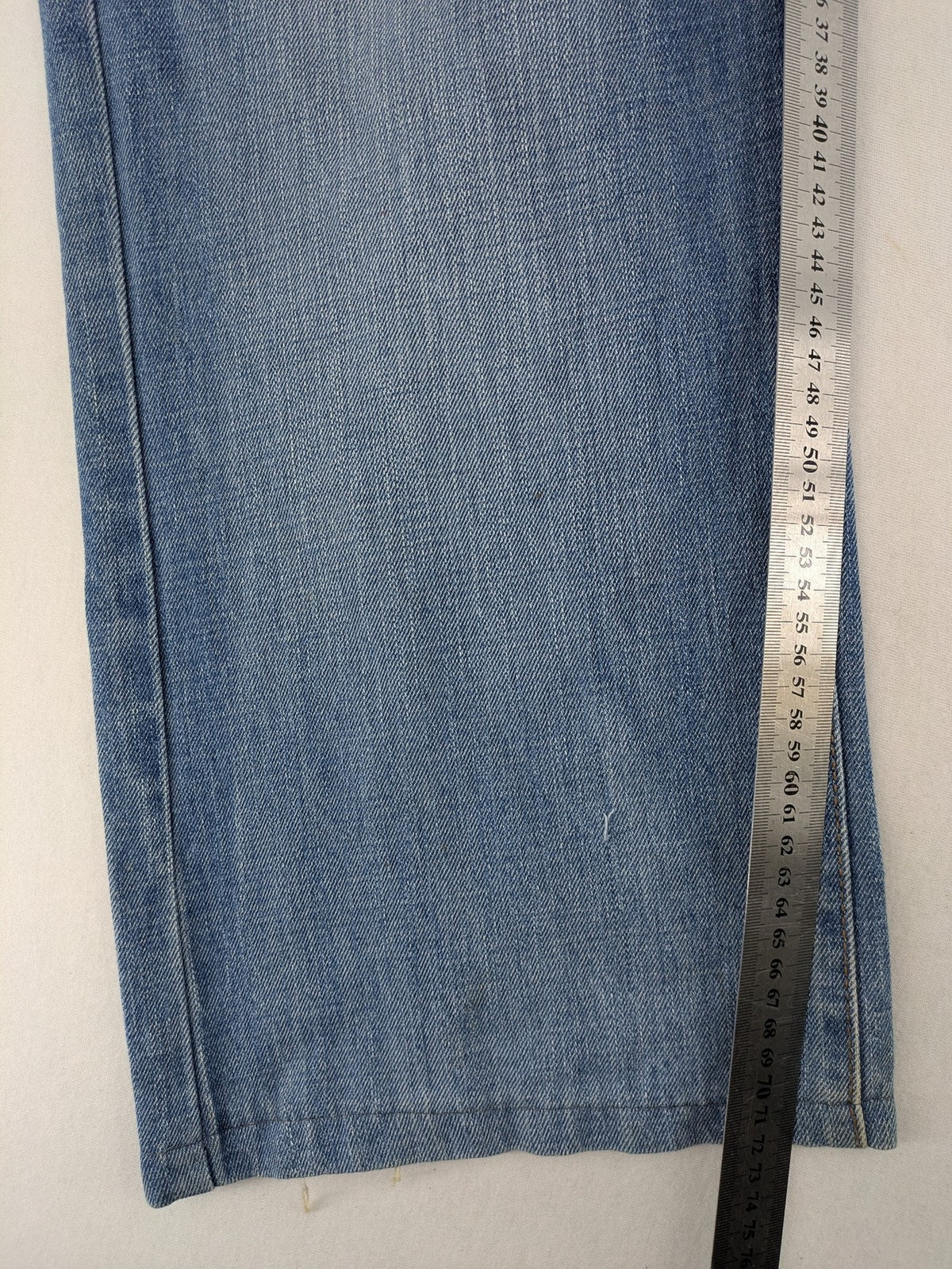 C&A blue straight jeans 5-pocket style with logo and button closure.