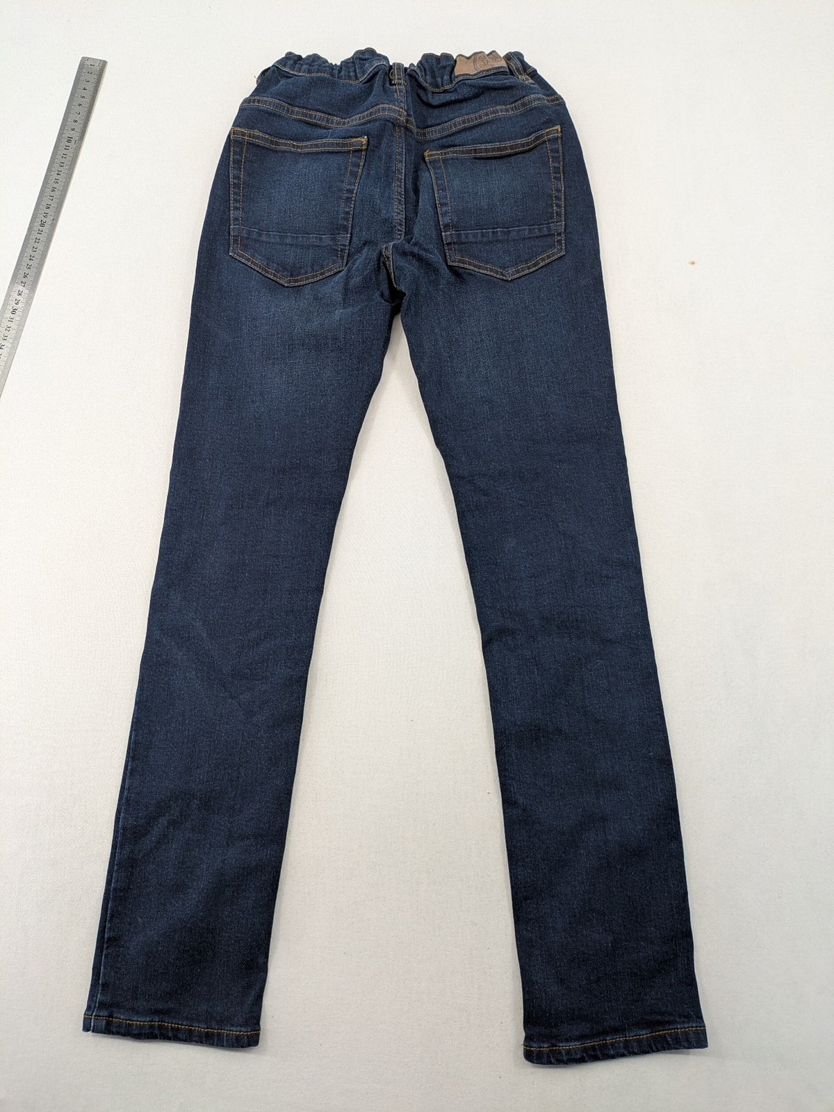 Skate Nation blue straight jeans 5-pocket design with adjustable waistband and dark wash.