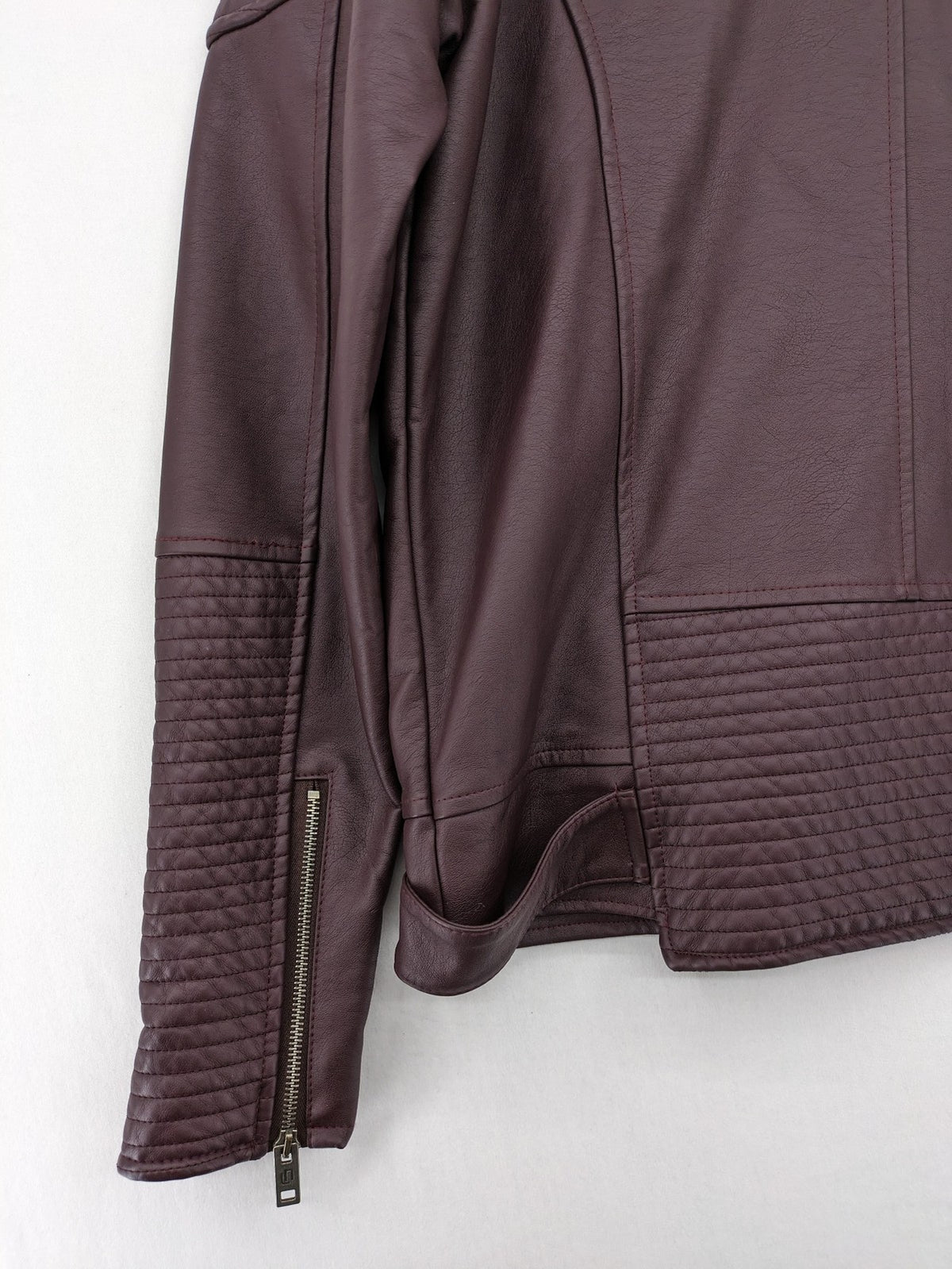 Leif Nelson burgundy biker jacket faux leather with quilted shoulder and sleeve details.