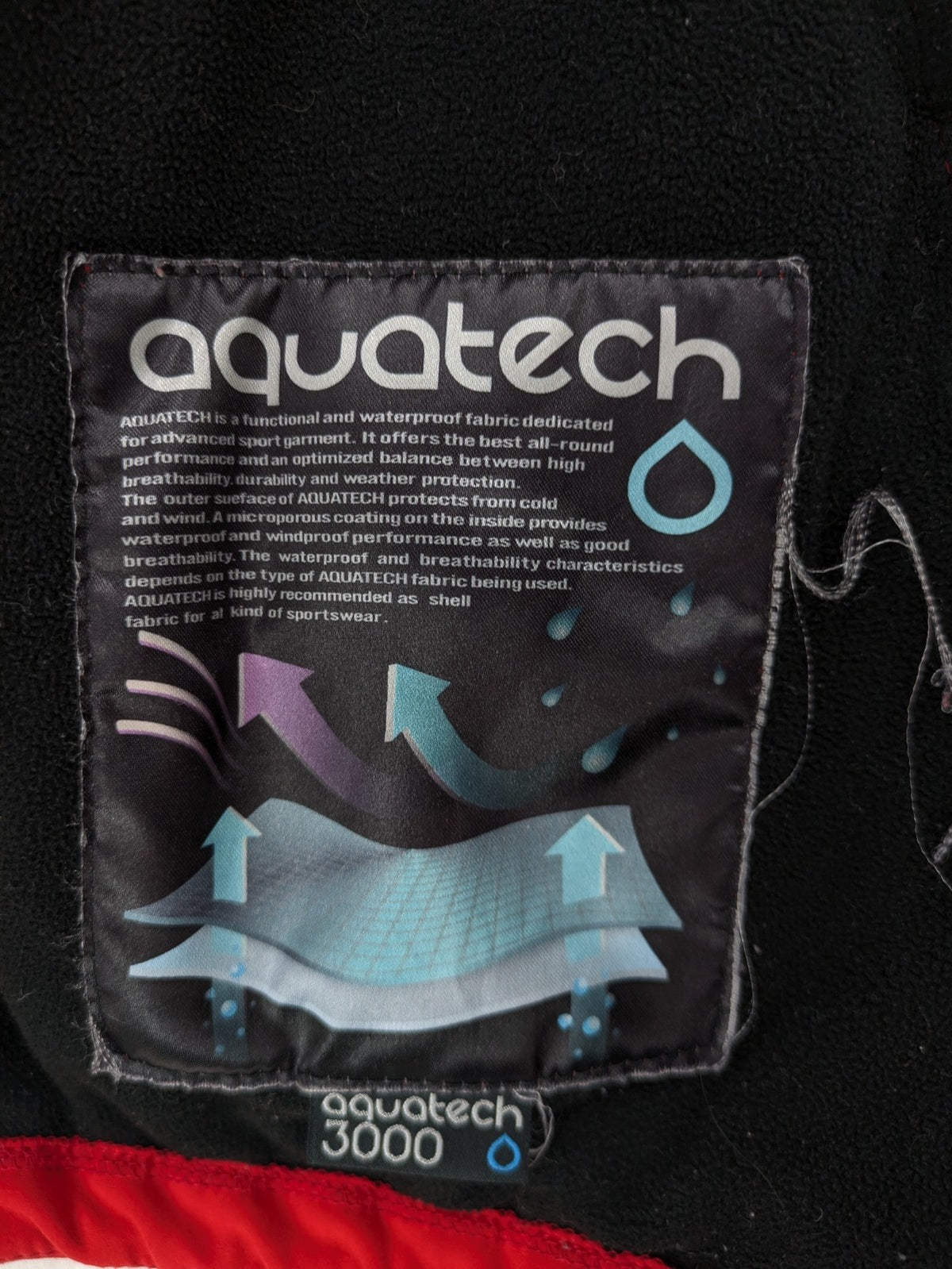 4F red softshell jacket with fleece lining and Aquatech 3000 logo detail.