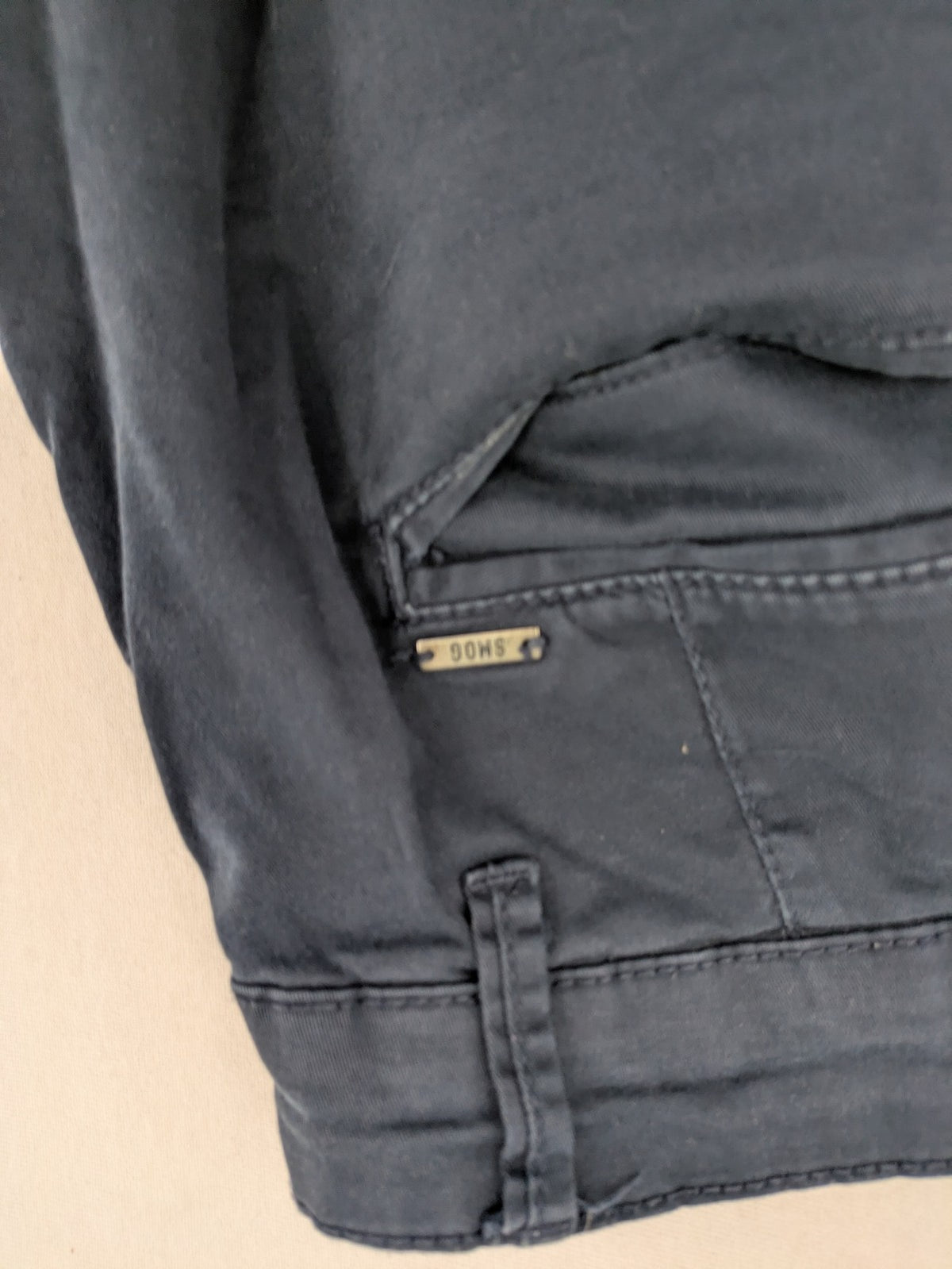 smog blue chino pants with belt loops, button fly, and side pockets