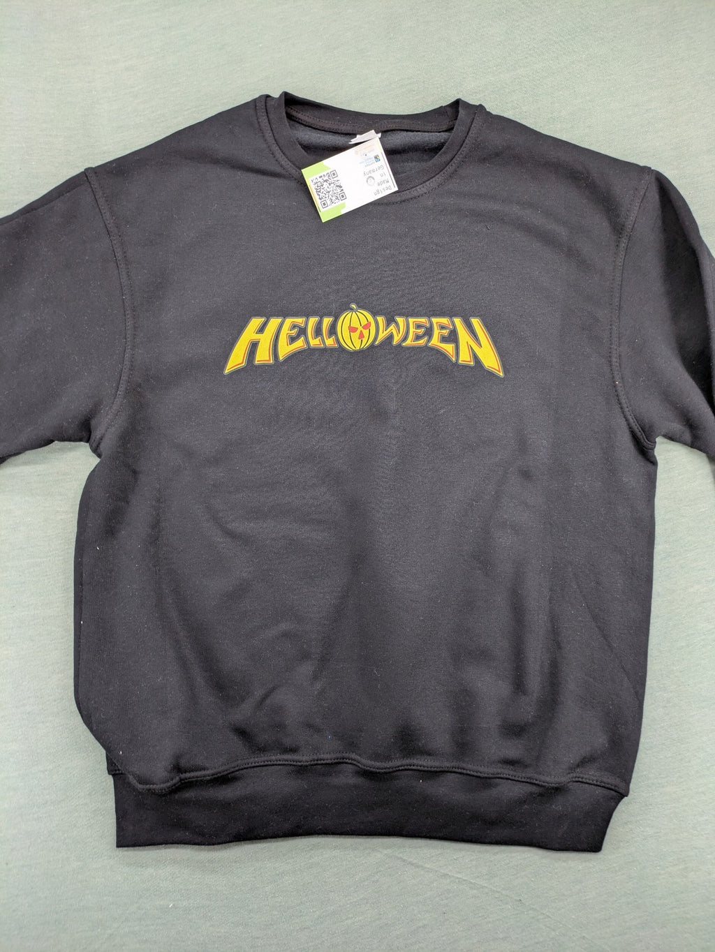Helloween orange sweatshirt featuring iconic band logo in yellow, soft cotton blend material.